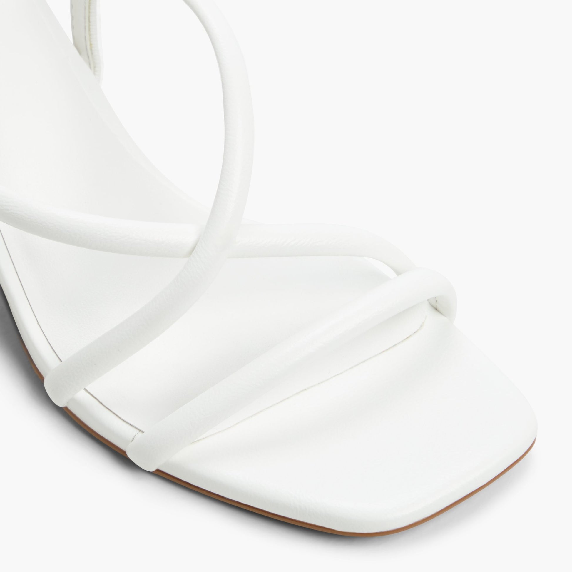Close-up of the White Kiira Strappy Block Heel Sandals
