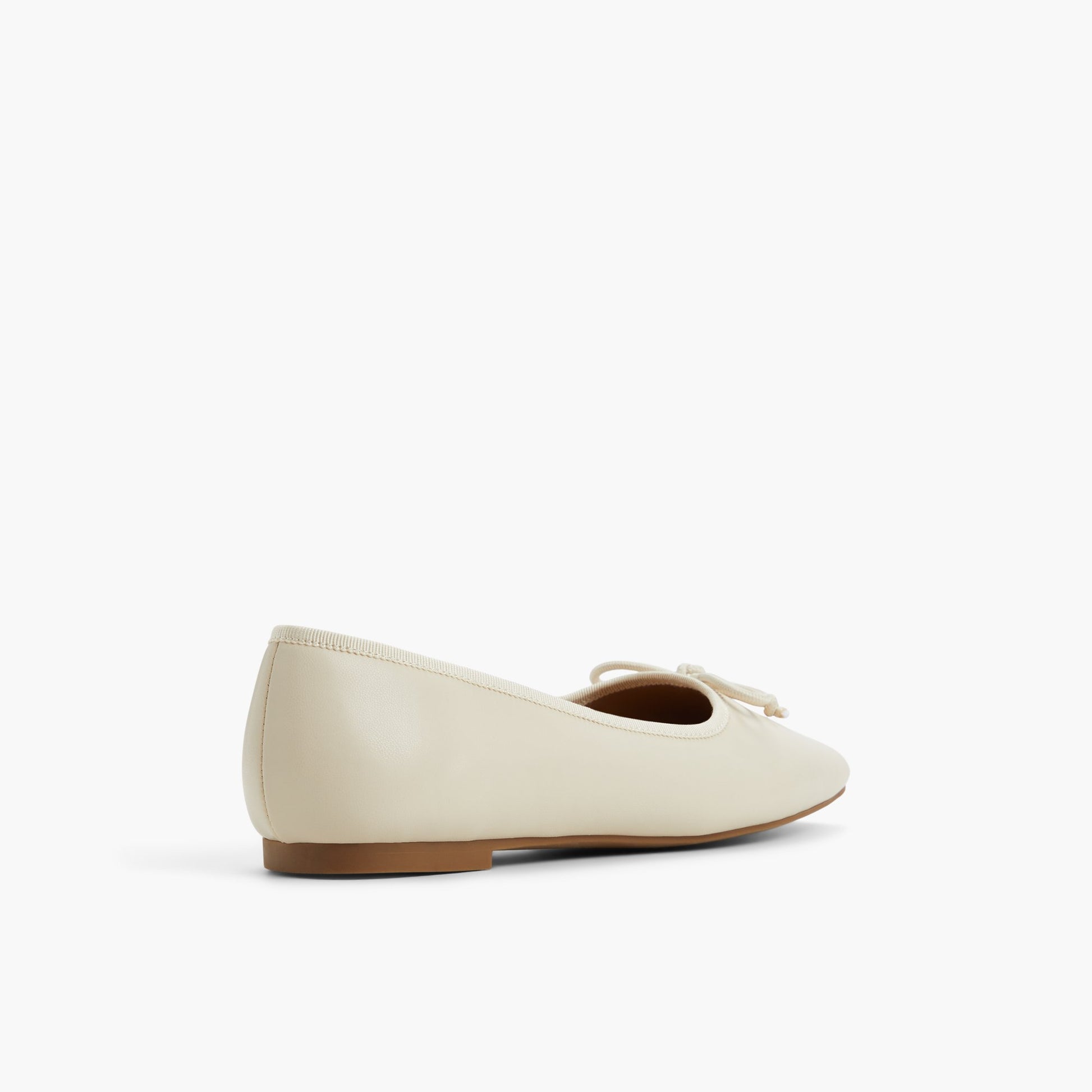 Three-quarter angle of Bone Camiille Ballerina Flats's back side