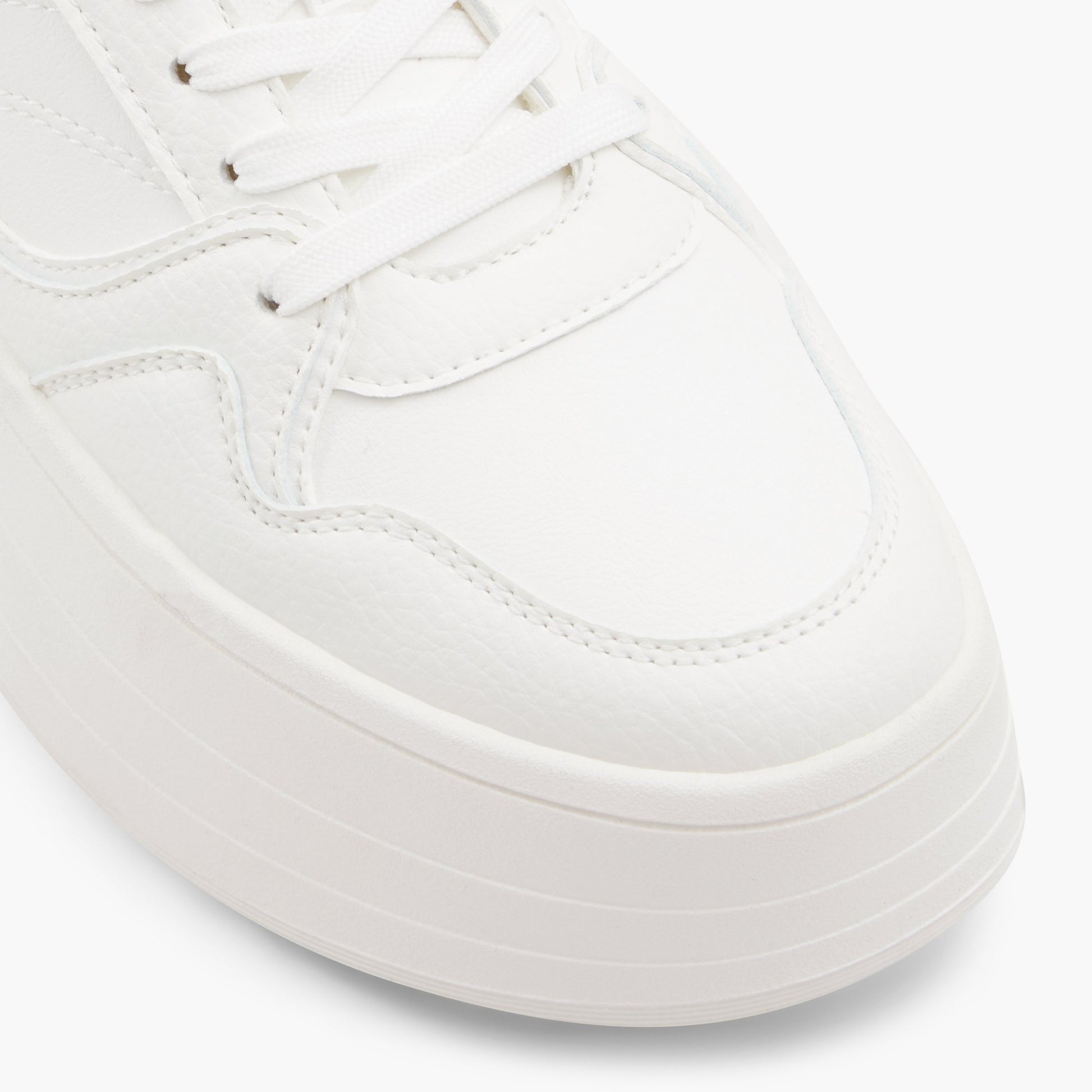 Close-up of the White Eviie Flatform Sneakers