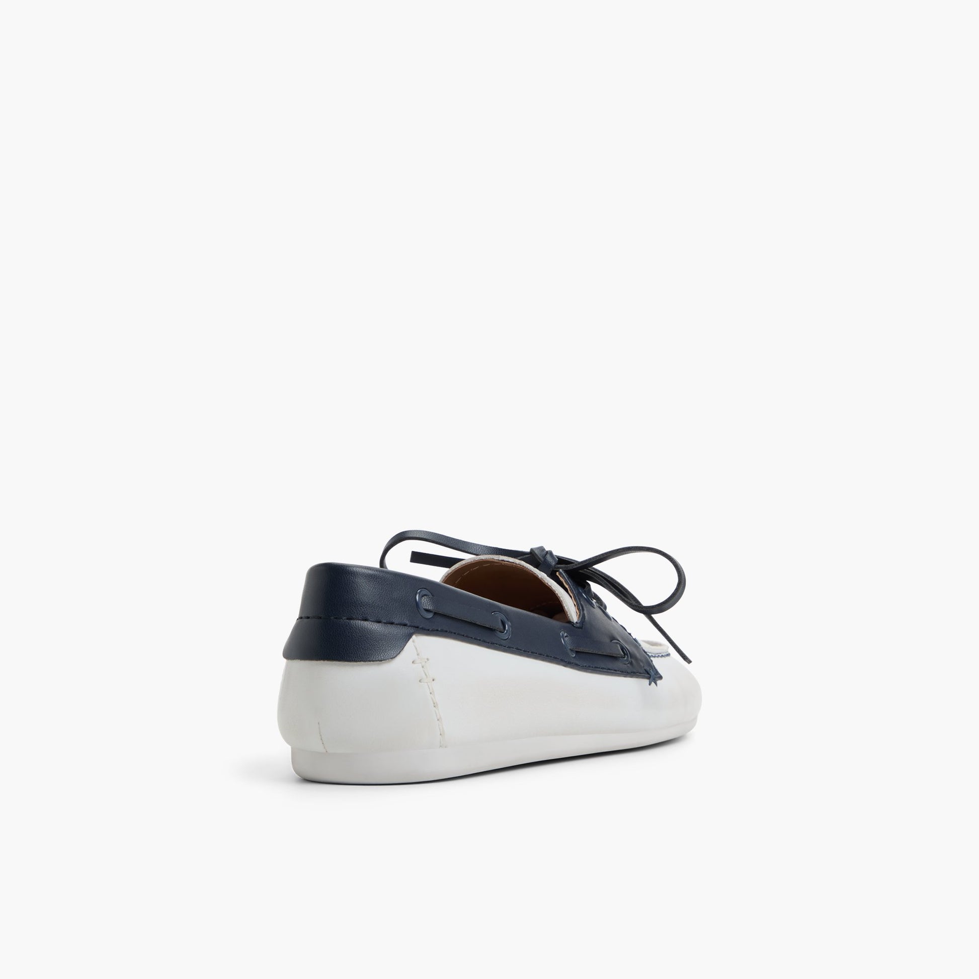 Three-quarter angle of White/Navy Shelly Boat Shoes's back side