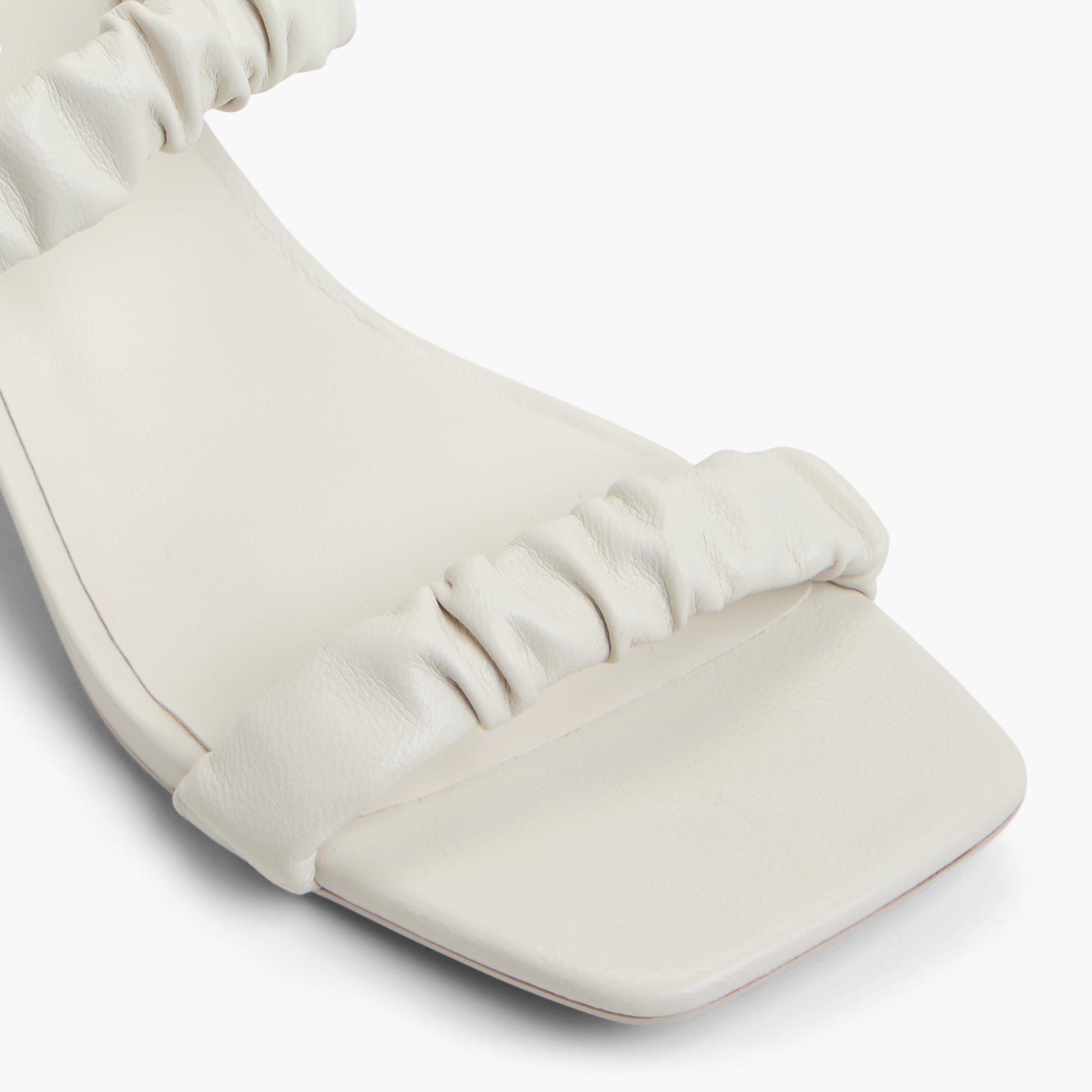 Close-up of the Ice Briannah Block Heel Mules