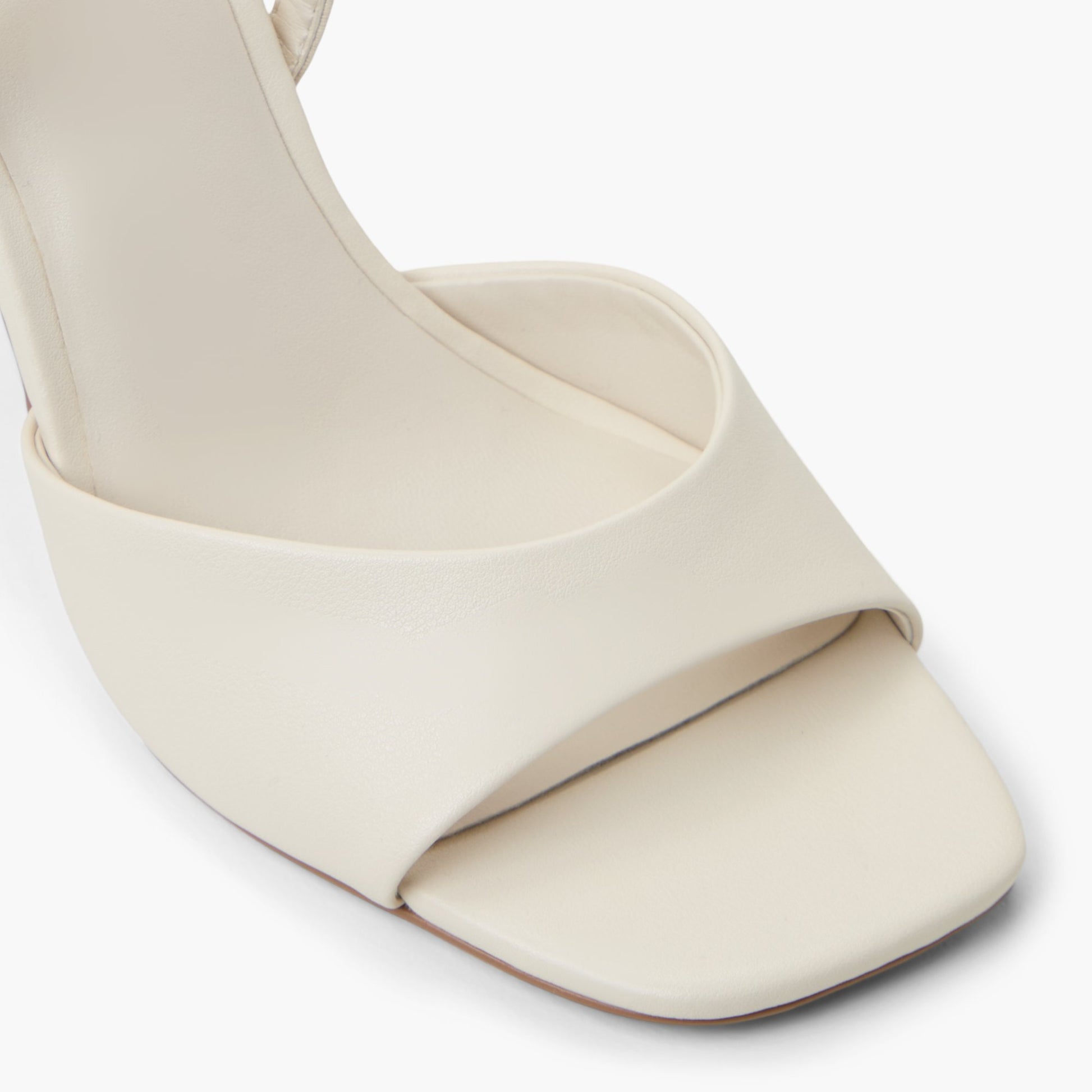 Close-up of the Bone Chellsea Block Heel Slingback Sandals