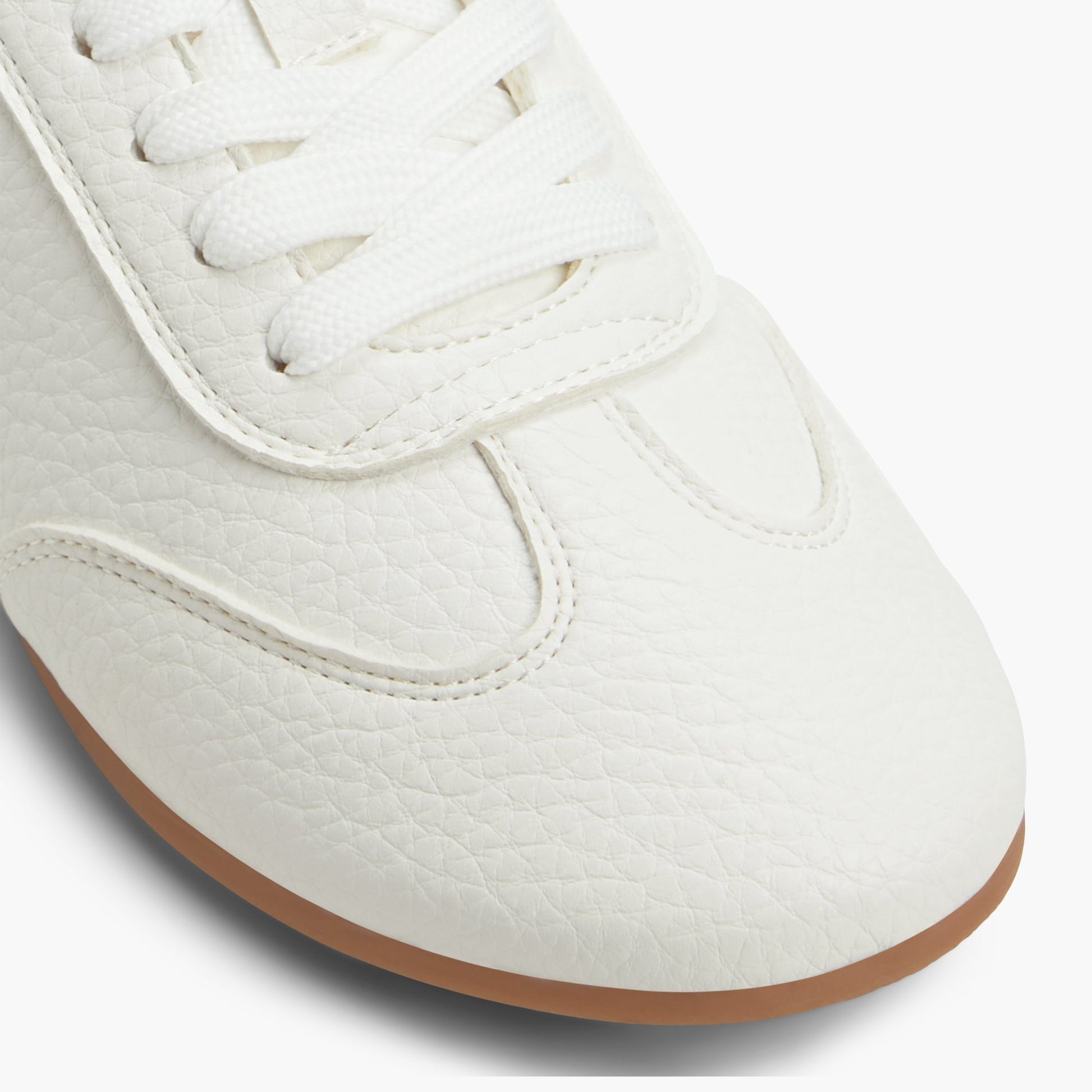 Close-up of the White Quincie Low-Top Sneakers