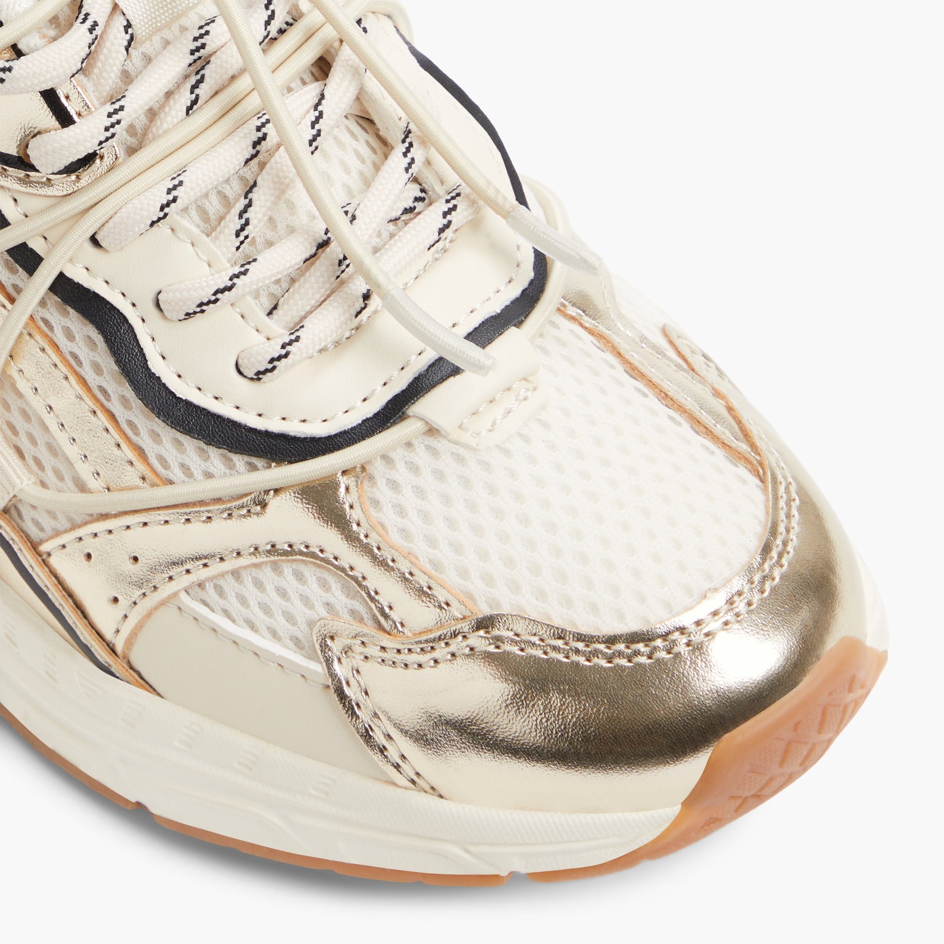 Close-up of the Gold Cielia Low-Top Sneakers