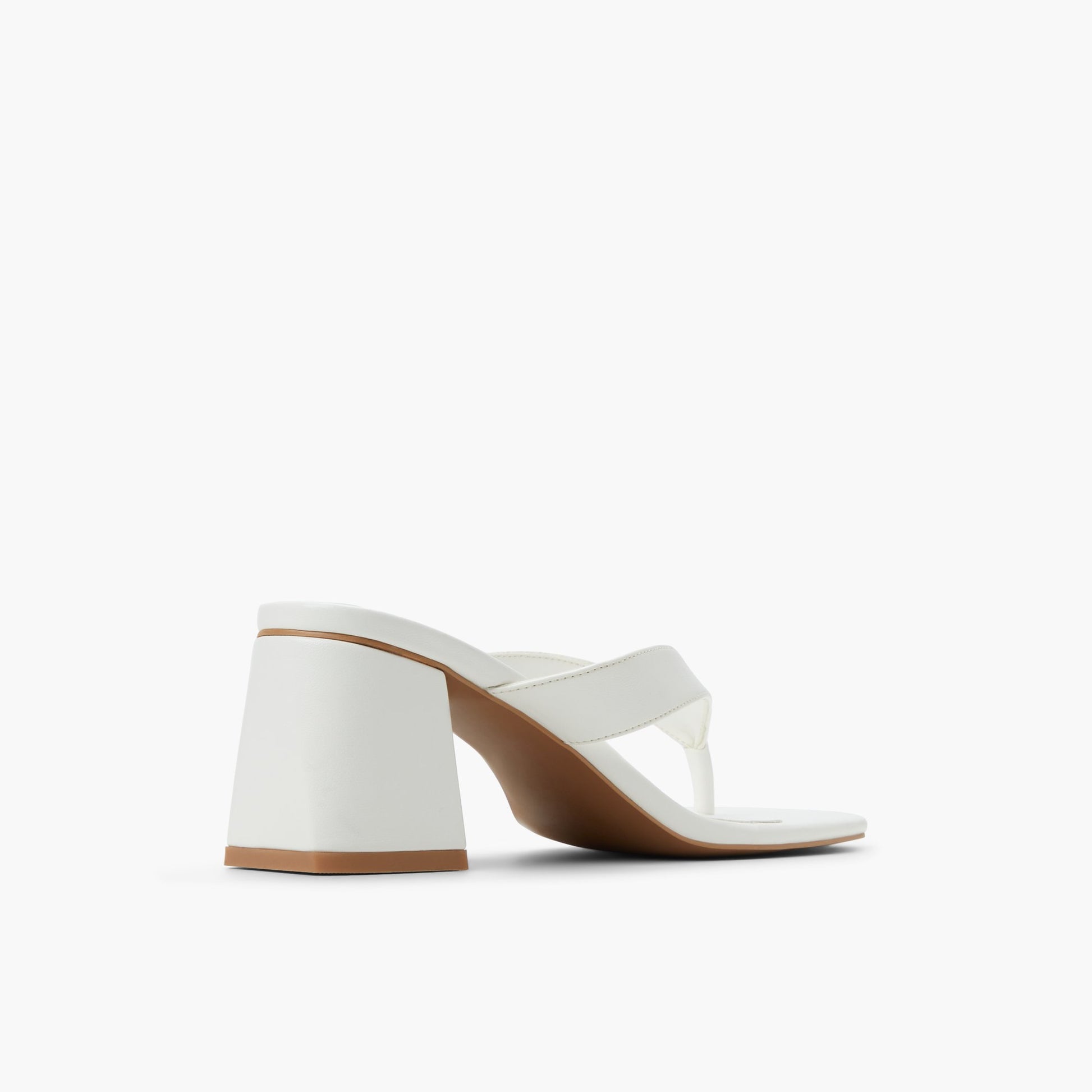Three-quarter angle of White Calii Block  Heel Thong Sandals's back side