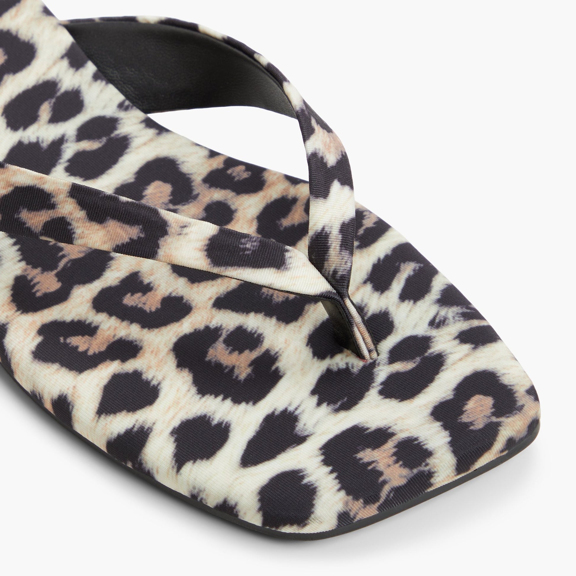 Close-up of the Brown Overflow Kayce Thong Sandals