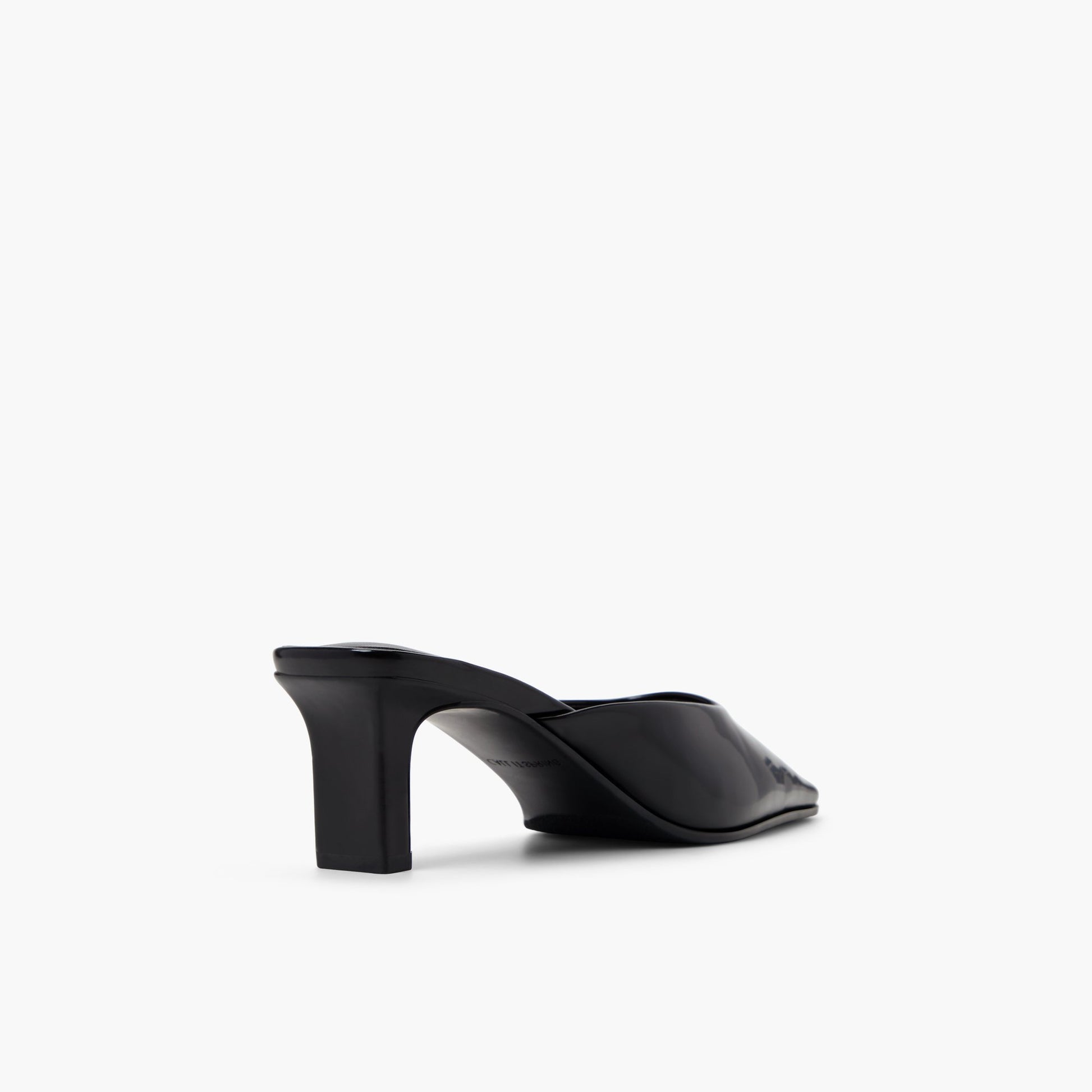 Three-quarter angle of Black Zahraa Mid-Heel Mules's back side