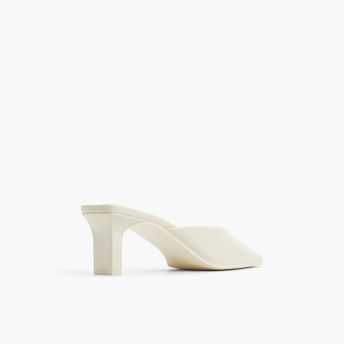 Three-quarter angle of Ice Zahraa Mid-Heel Mules's back side