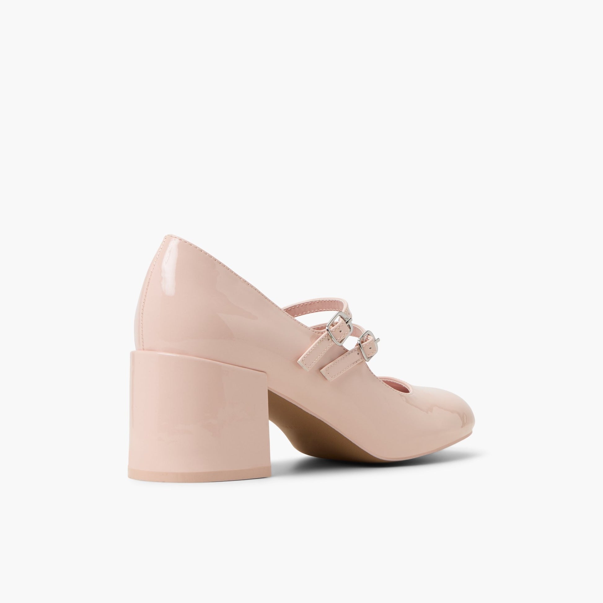 Three-quarter angle of Light Pink Ruubyy Block Heel Mary Janes's back side