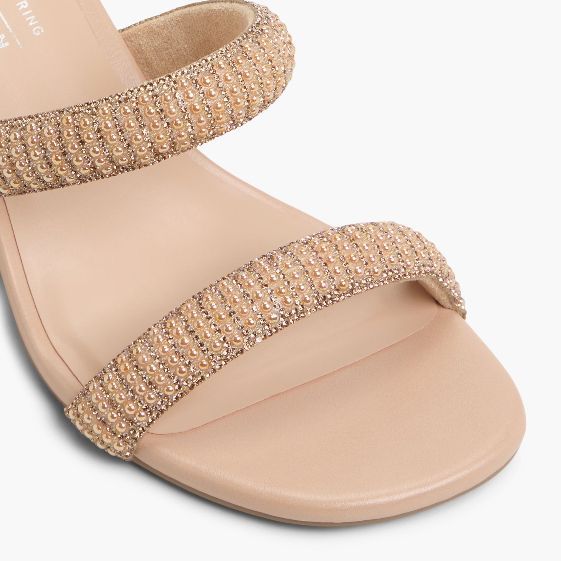 Close-up of the Other Beige Calianaa Block Heel Mules