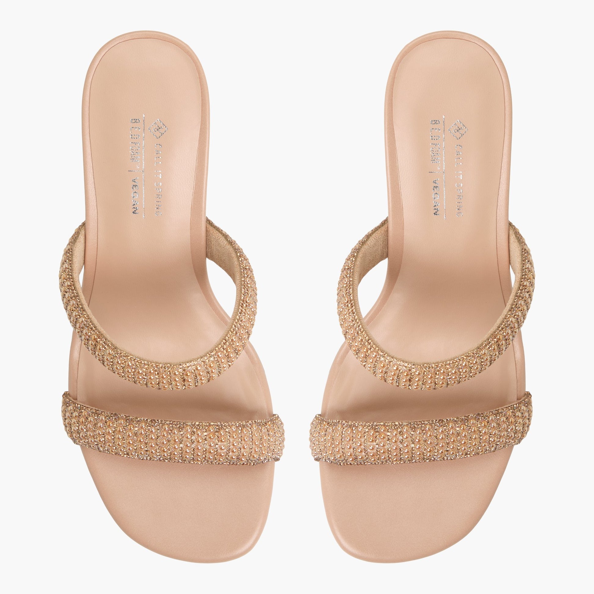 Top-down view of the Other Beige Calianaa Block Heel Mules