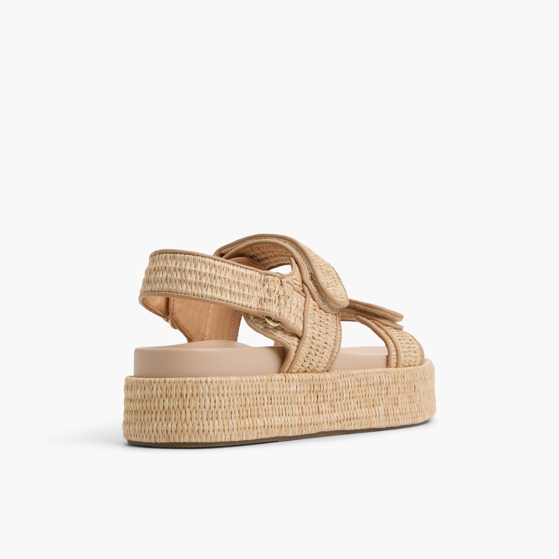 Three-quarter angle of Natural Mauii Slingback Sandals's back side