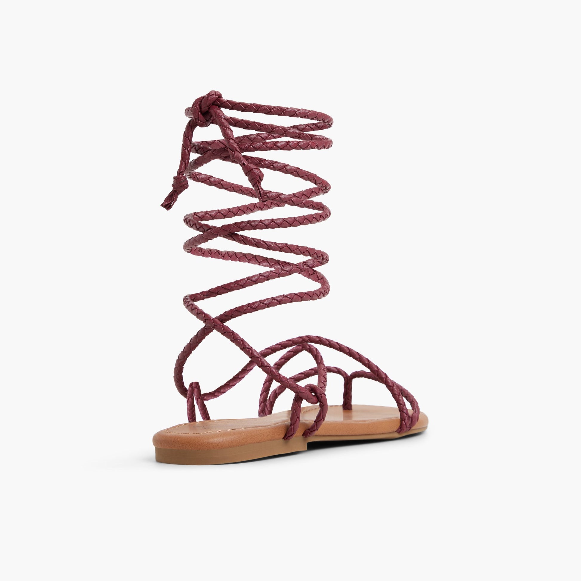 Three-quarter angle of Dark Pink Romiie Gladiator Flat Sandals's back side