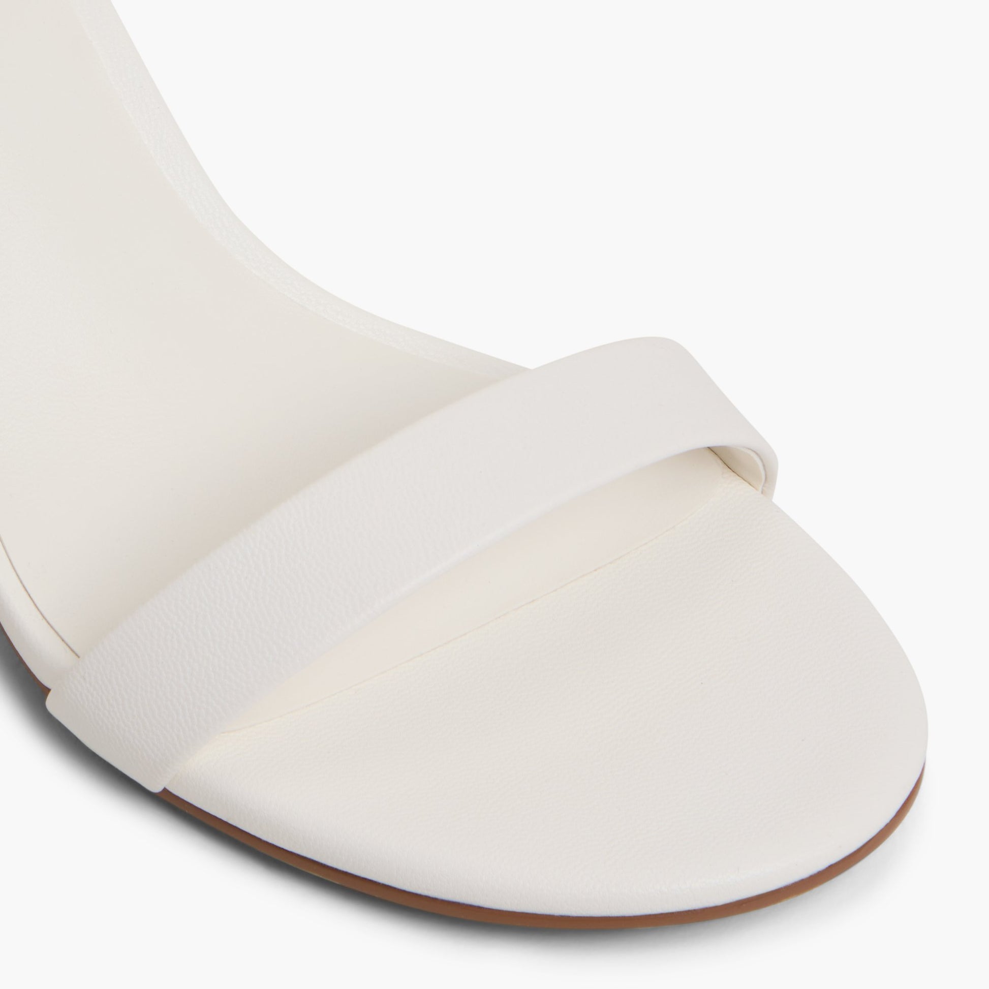 Close-up of the White Madelyyn Kitten Heel Sandals