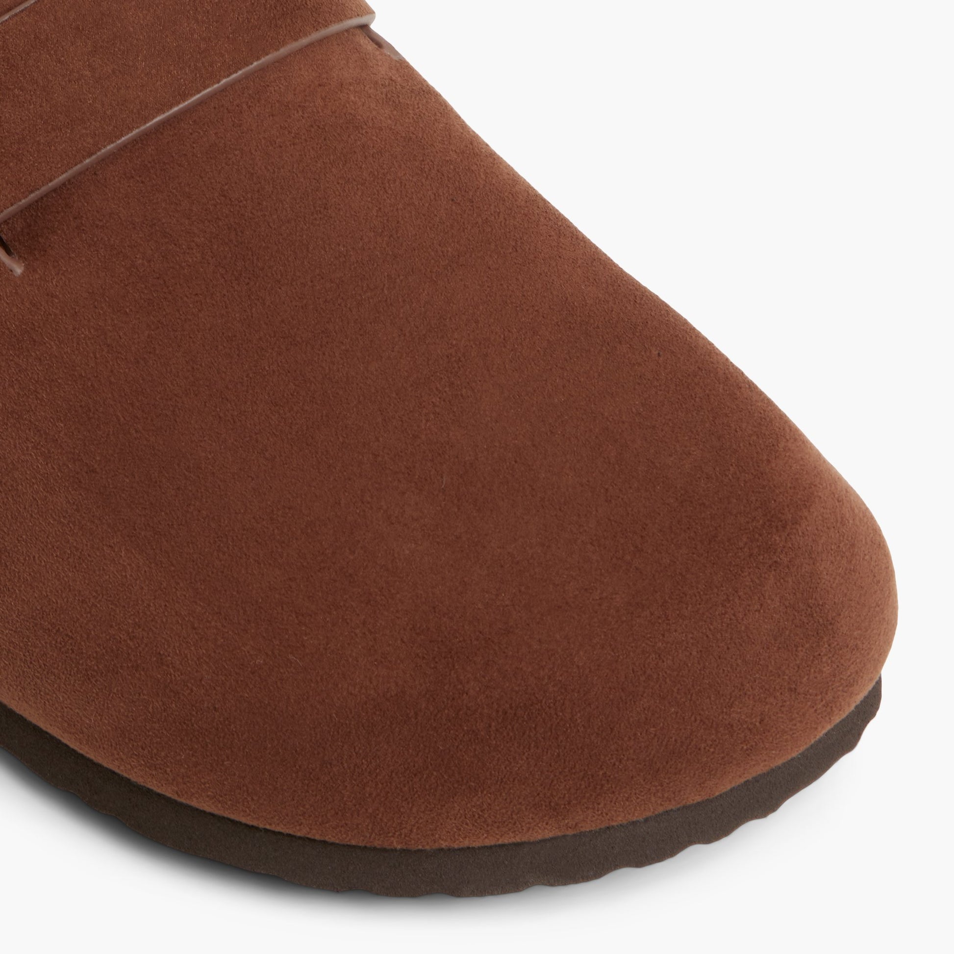 Close-up of the Dark brown Calli Clogs
