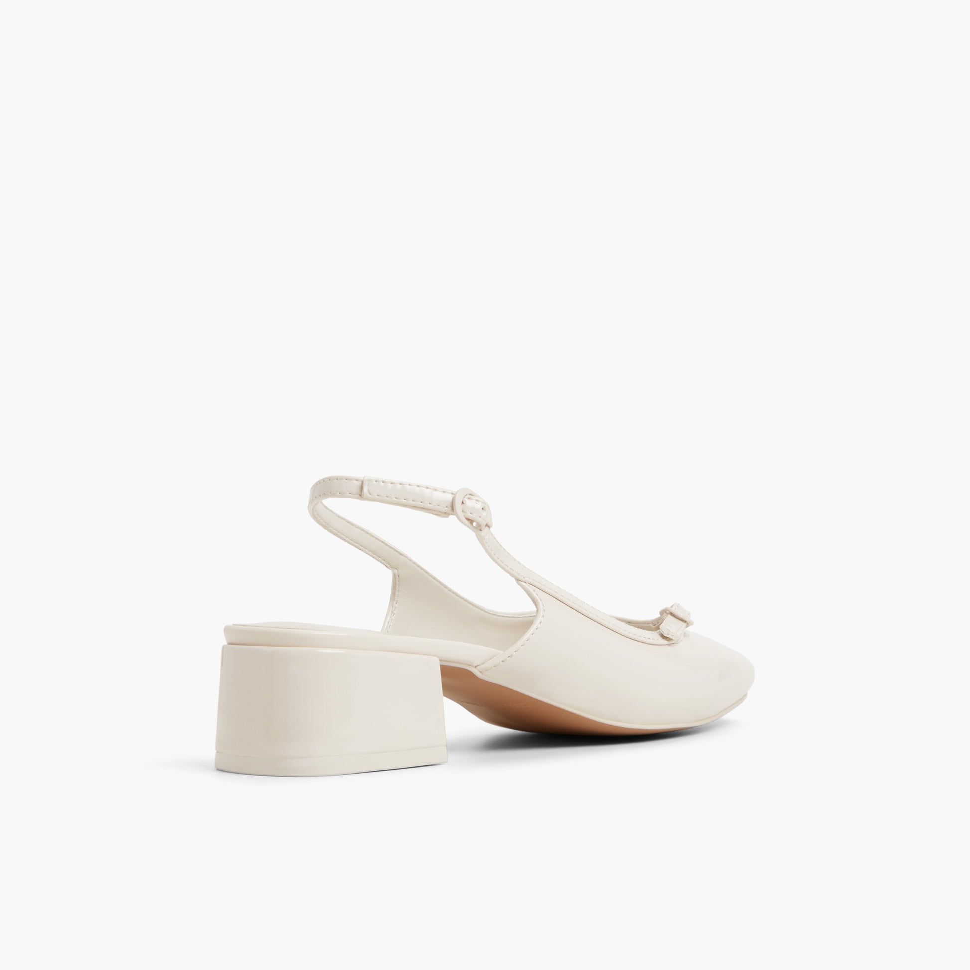 Three-quarter angle of Ice Harperrr Slingback Block Heels's back side
