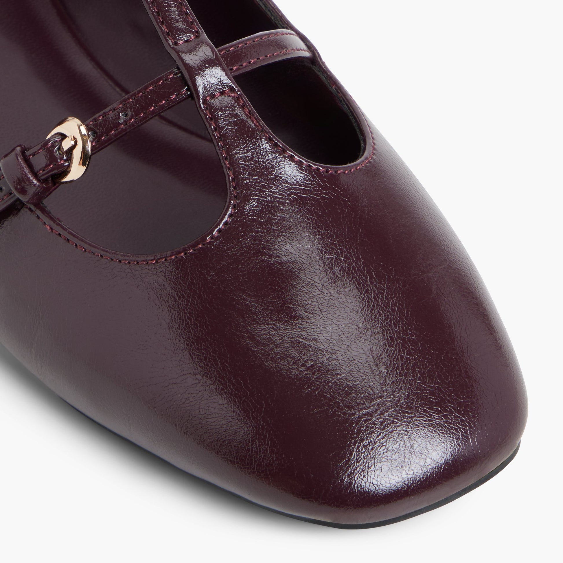 Close-up of the Bordo Eternelle T-bar Ballerinas