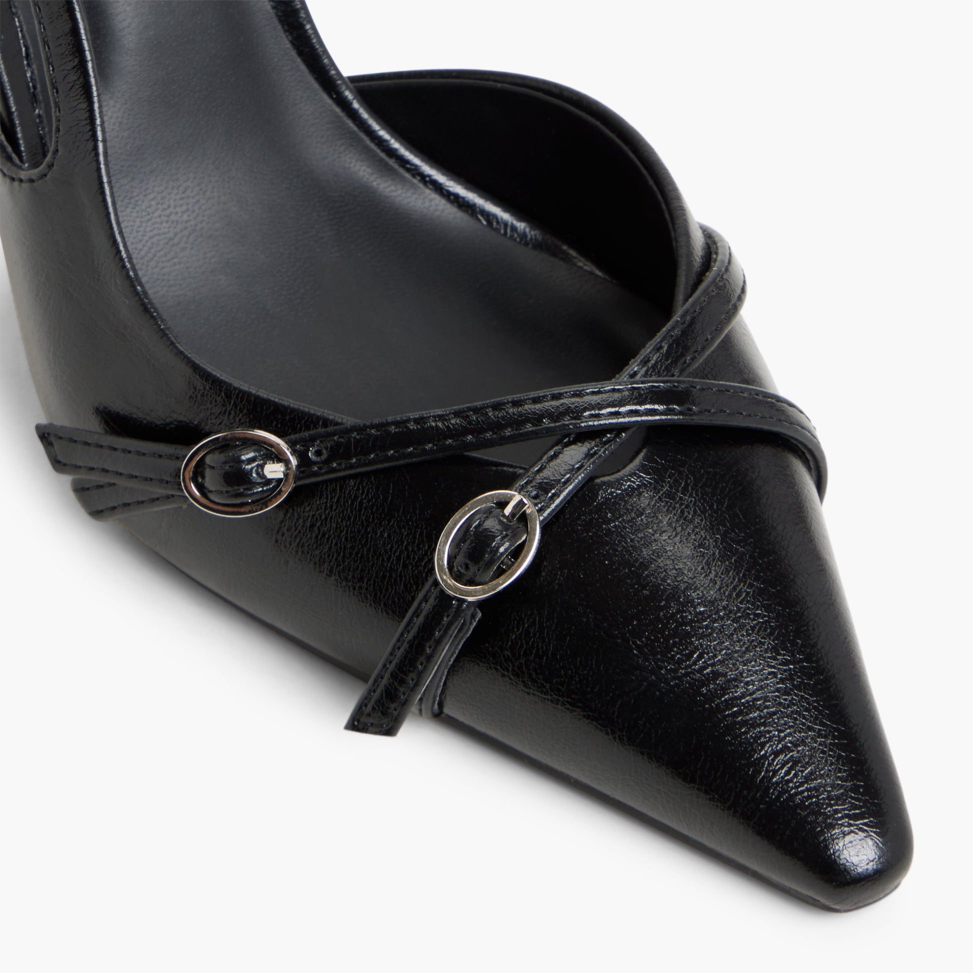 Close-up of the Black Niaa Slingback Pumps