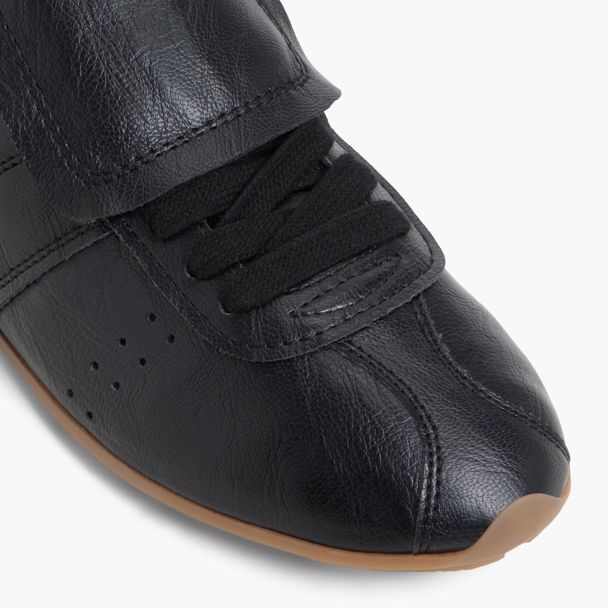Close-up of the Black Forward Low-Top Sneakers