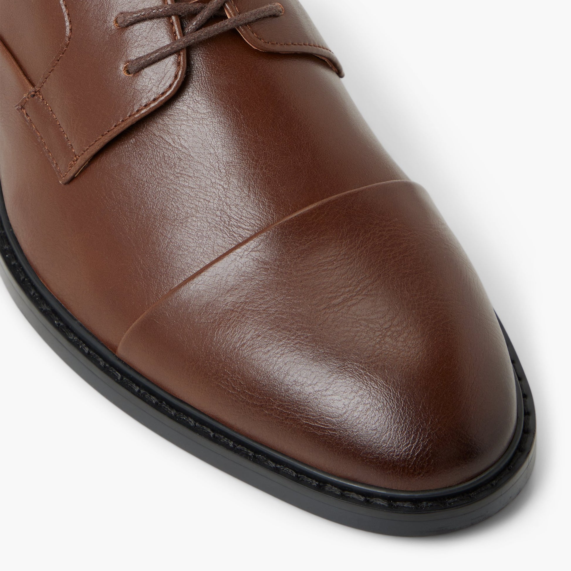 Close-up of the Cognac Desmarais Derby Shoes