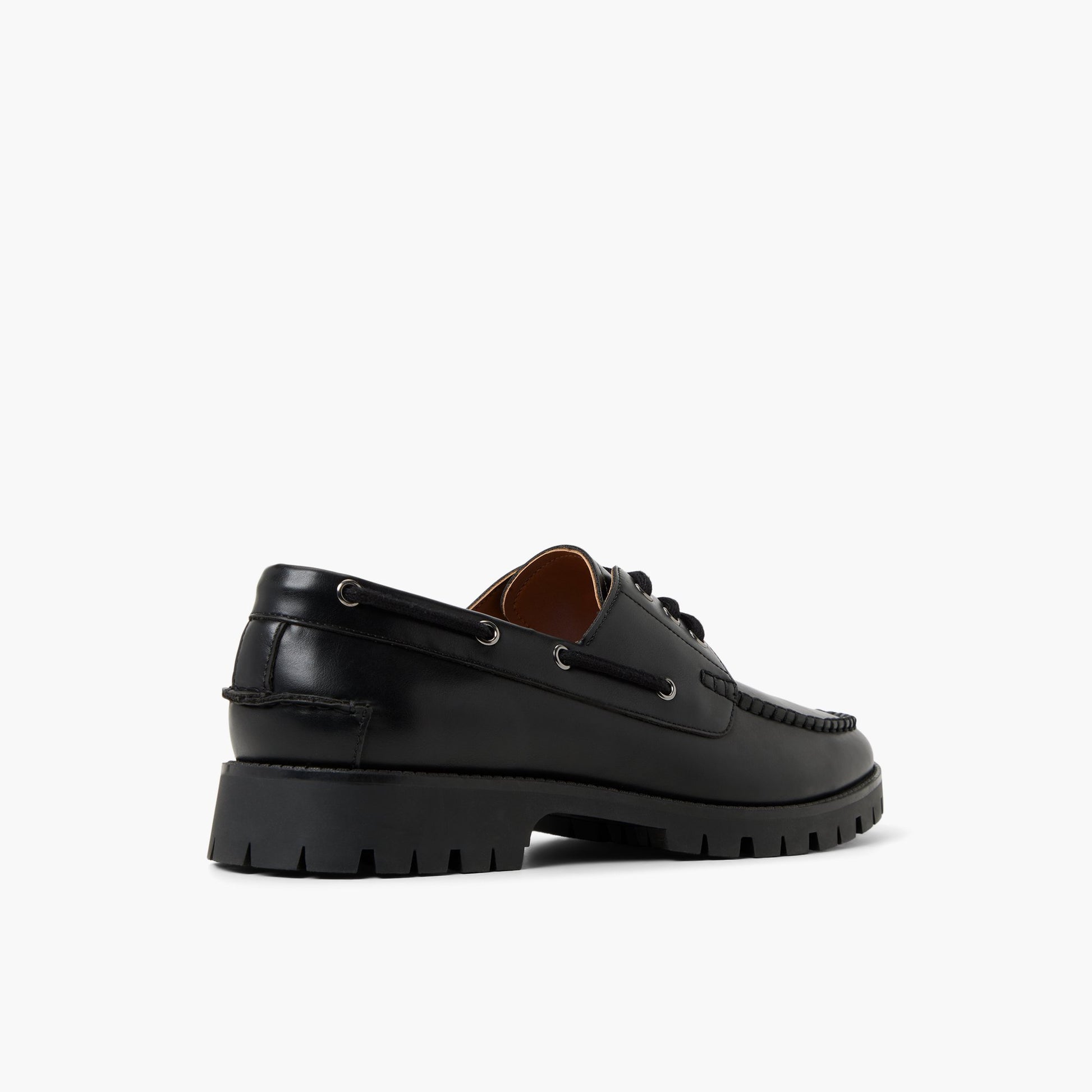 Three-quarter angle of Black Navarro Boat Shoes's back side