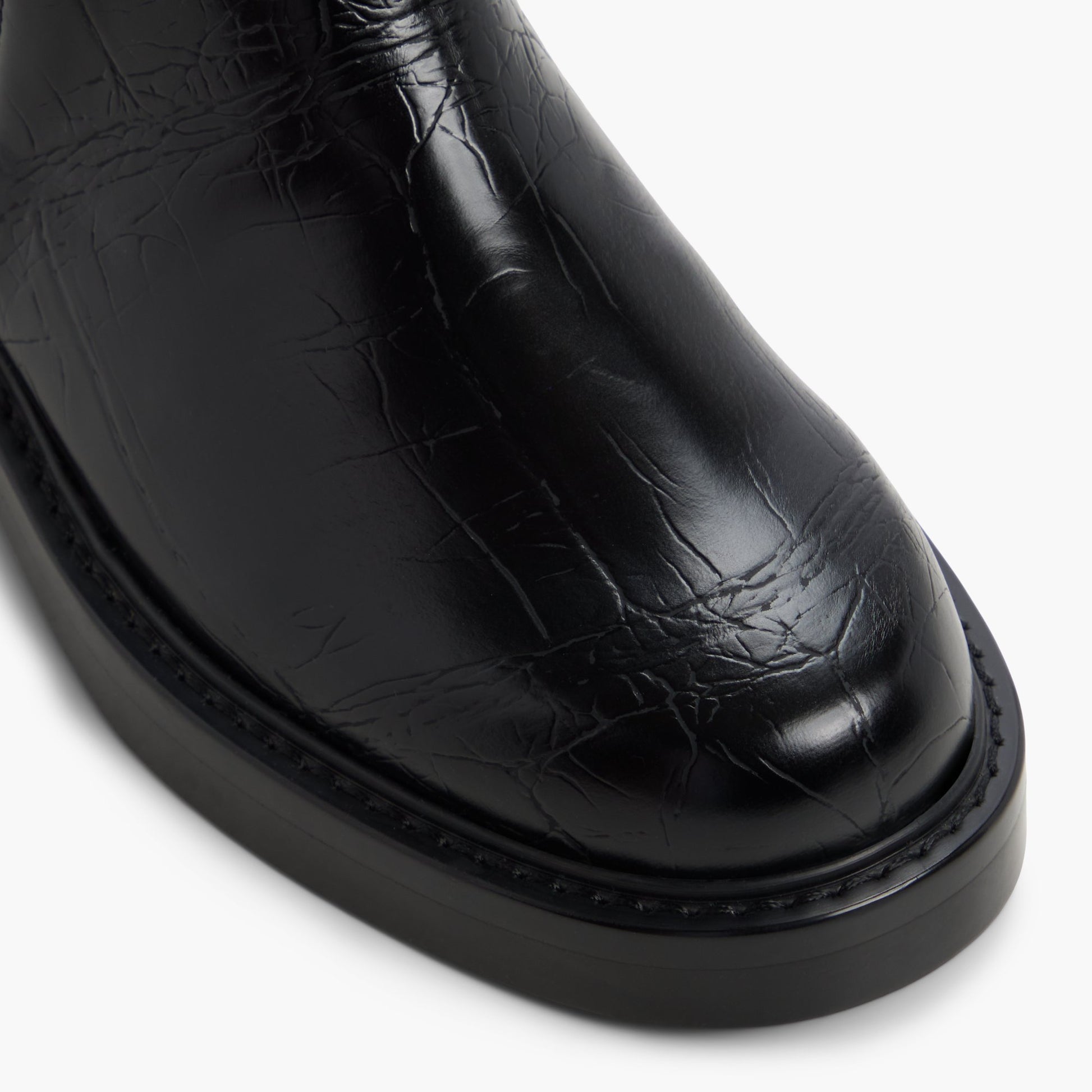 Close-up of the Other black Braxtonn Knee-High Boots