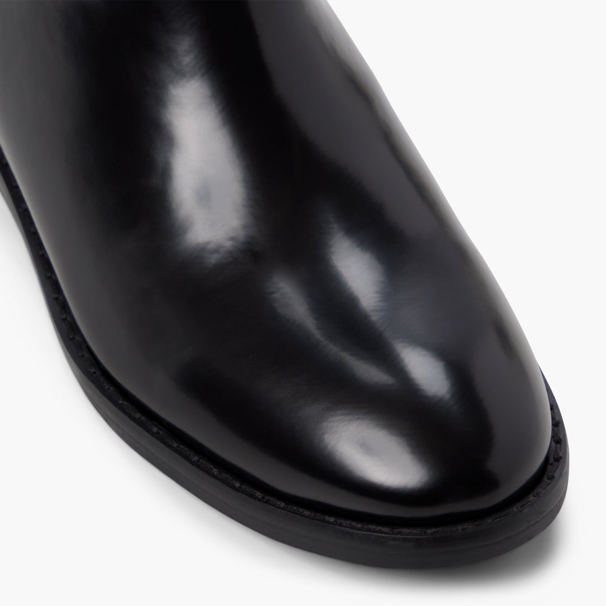 Close-up of the Other Black Canter Knee-High Boots