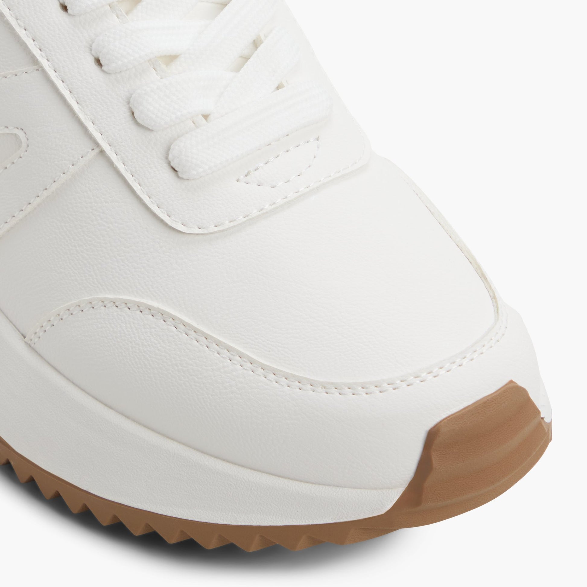 Close-up of the White Daniie Low-Top Sneakers