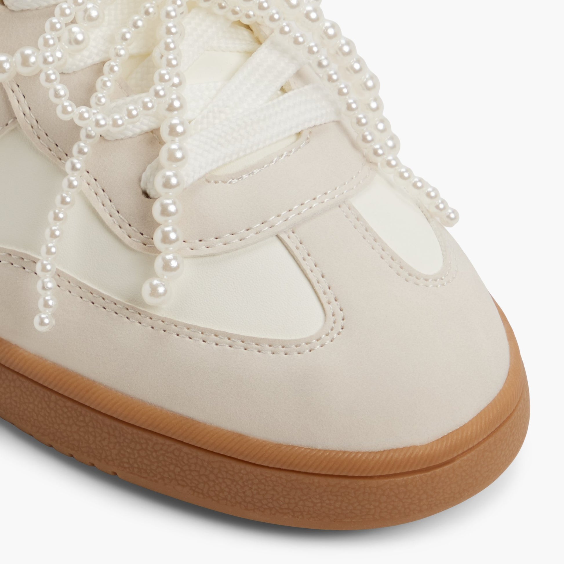 Close-up of the White multi Solae Sneakers