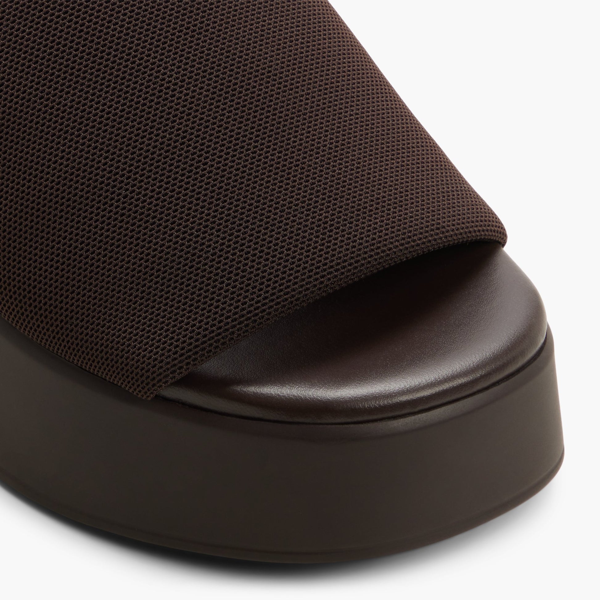 Close-up of the Dark brown Noemii Wedge Mules