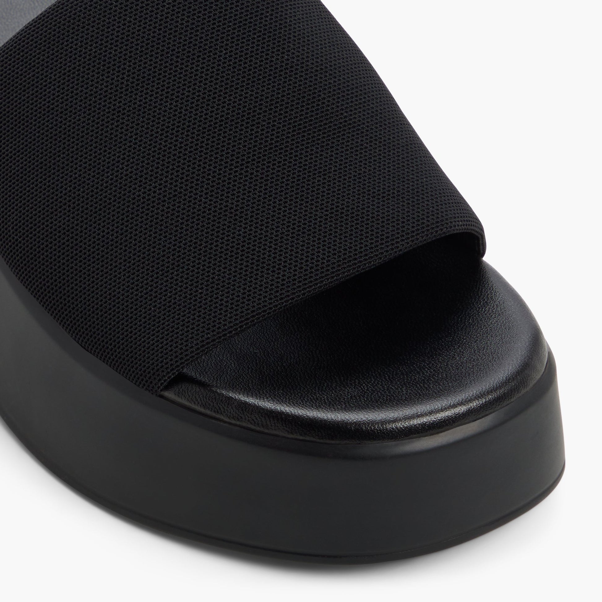 Close-up of the Open black Noemii Wedge Mules
