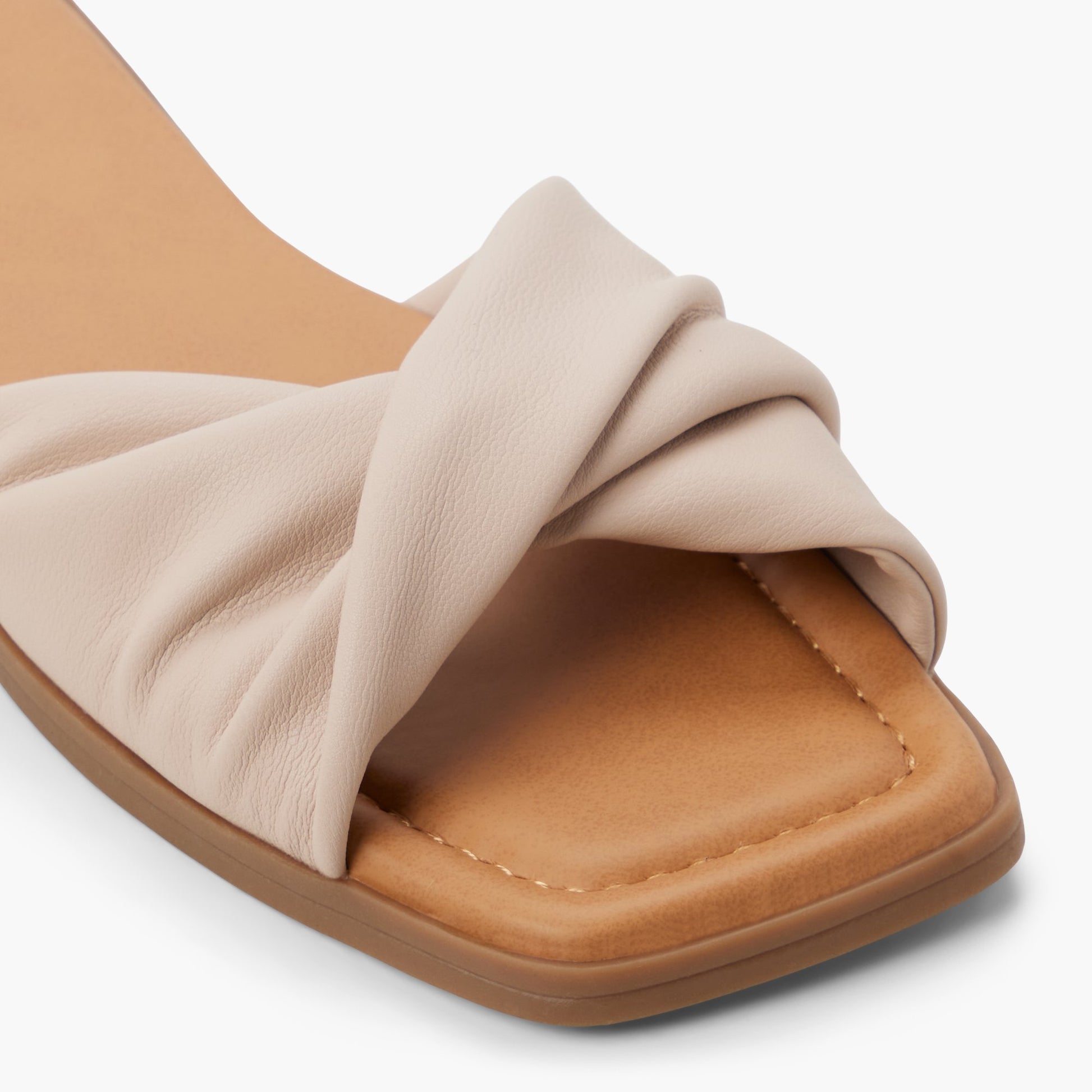 Close-up of the Bone Melonie Slides