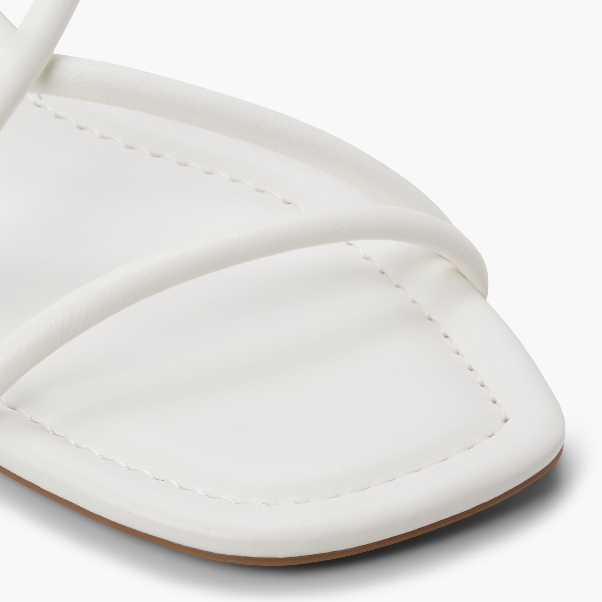 Close-up of the White Viira Strappy Sandals