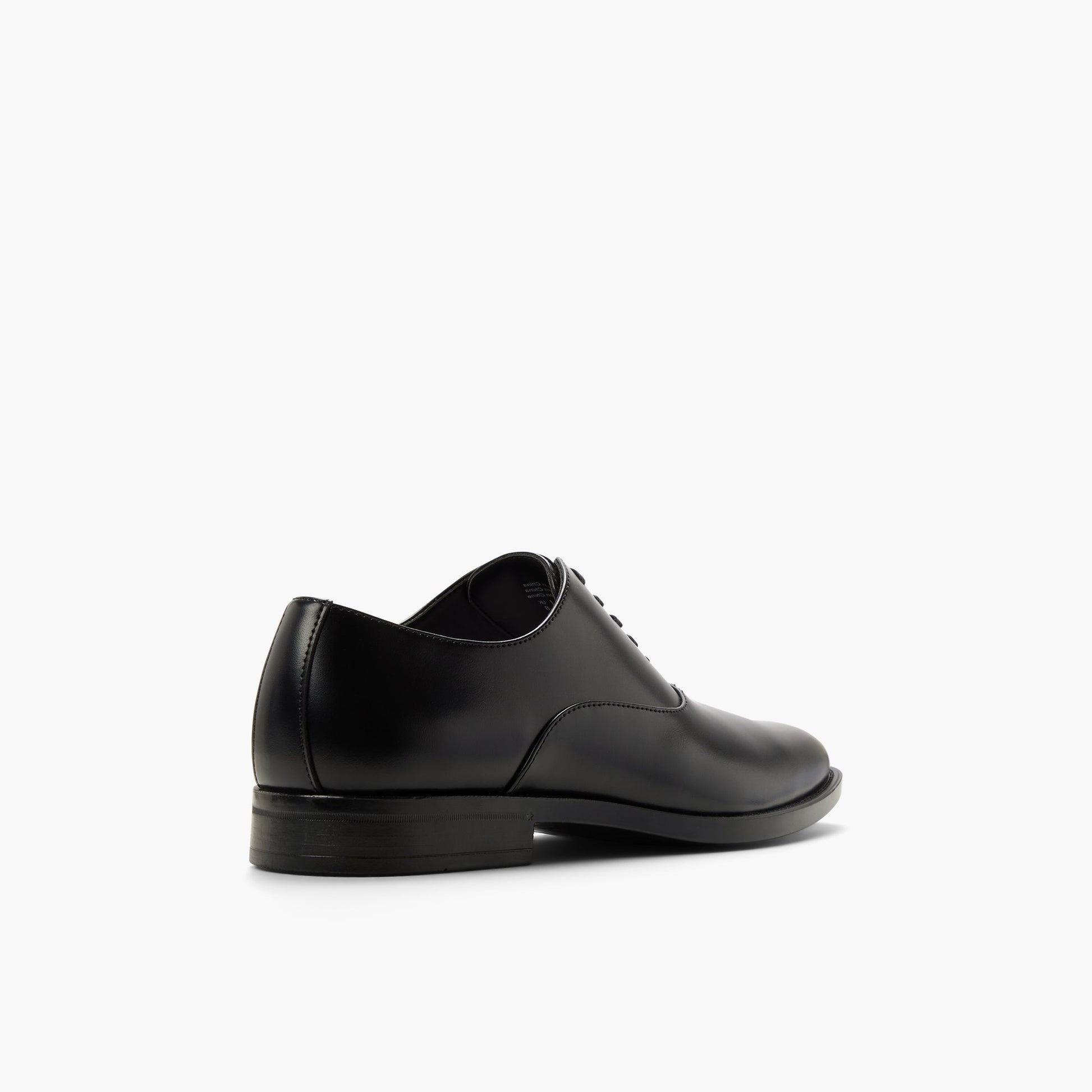 Test FR:Three-quarter angle of Noir Caraway Chaussures oxford's back side