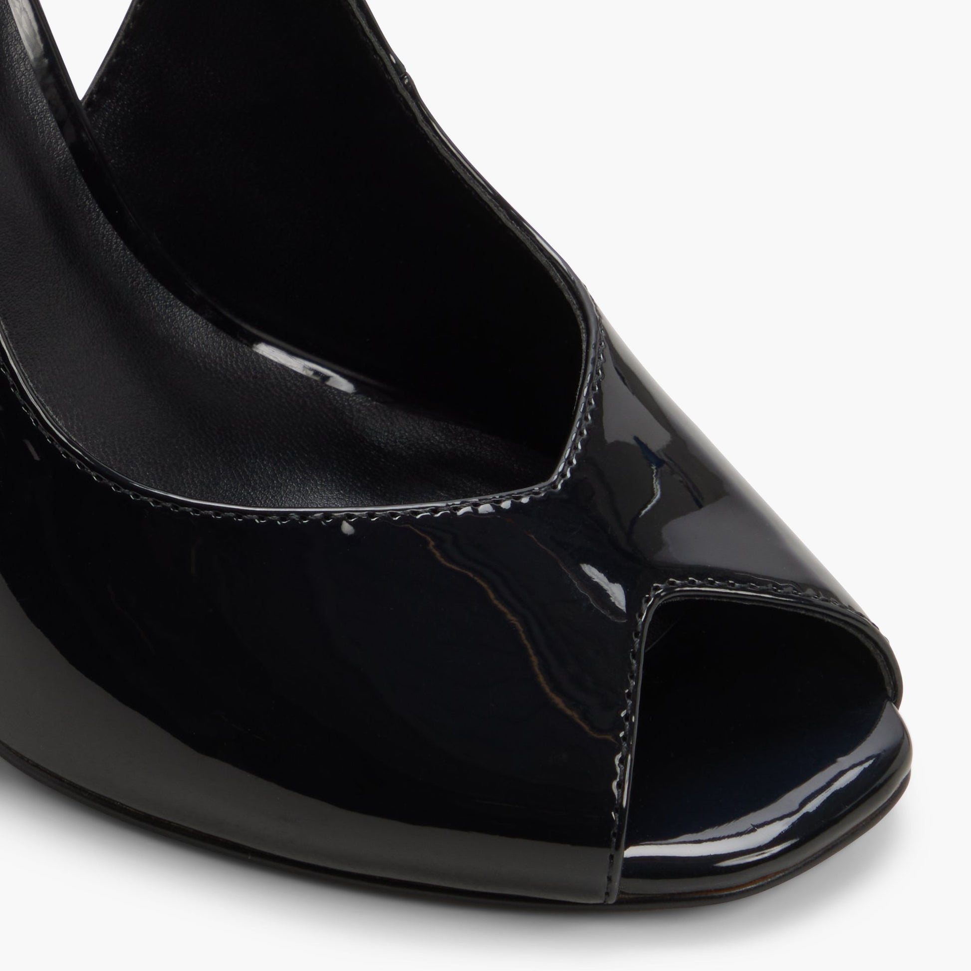Close-up of the Black Milenaa Peep-Toe Slingback Pumps