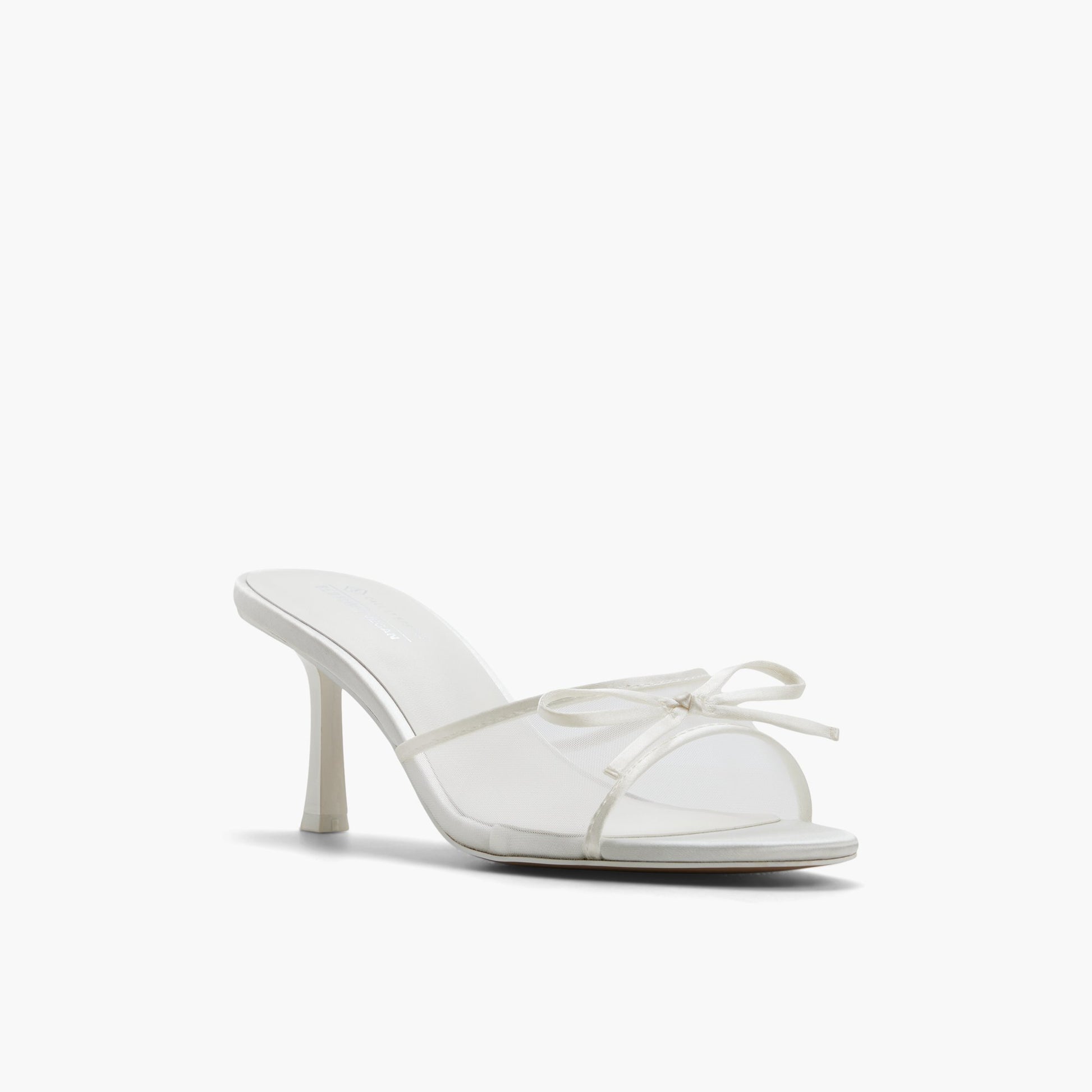 Test FR:Three-quarter angle of Blanc Bettiie Mules à talons moyens's front side