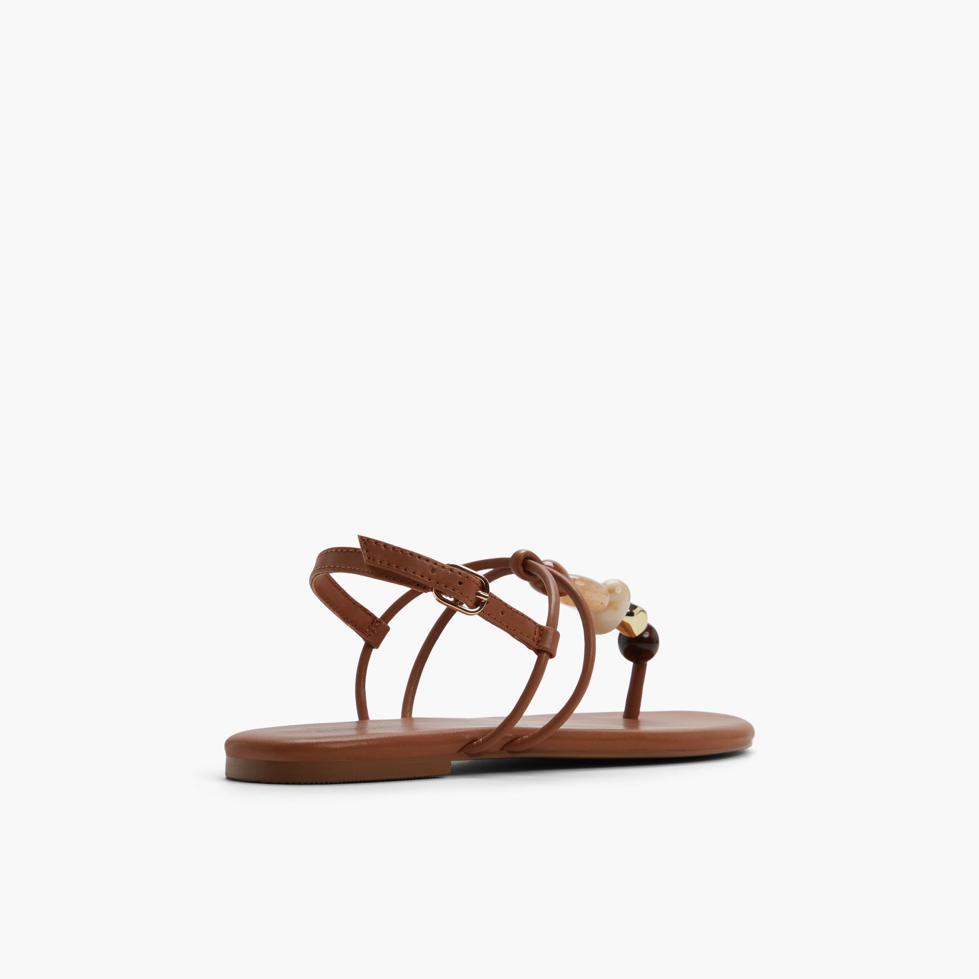 Three-quarter angle of Cognac Topaaz T-Bar Thong Sandals's back side