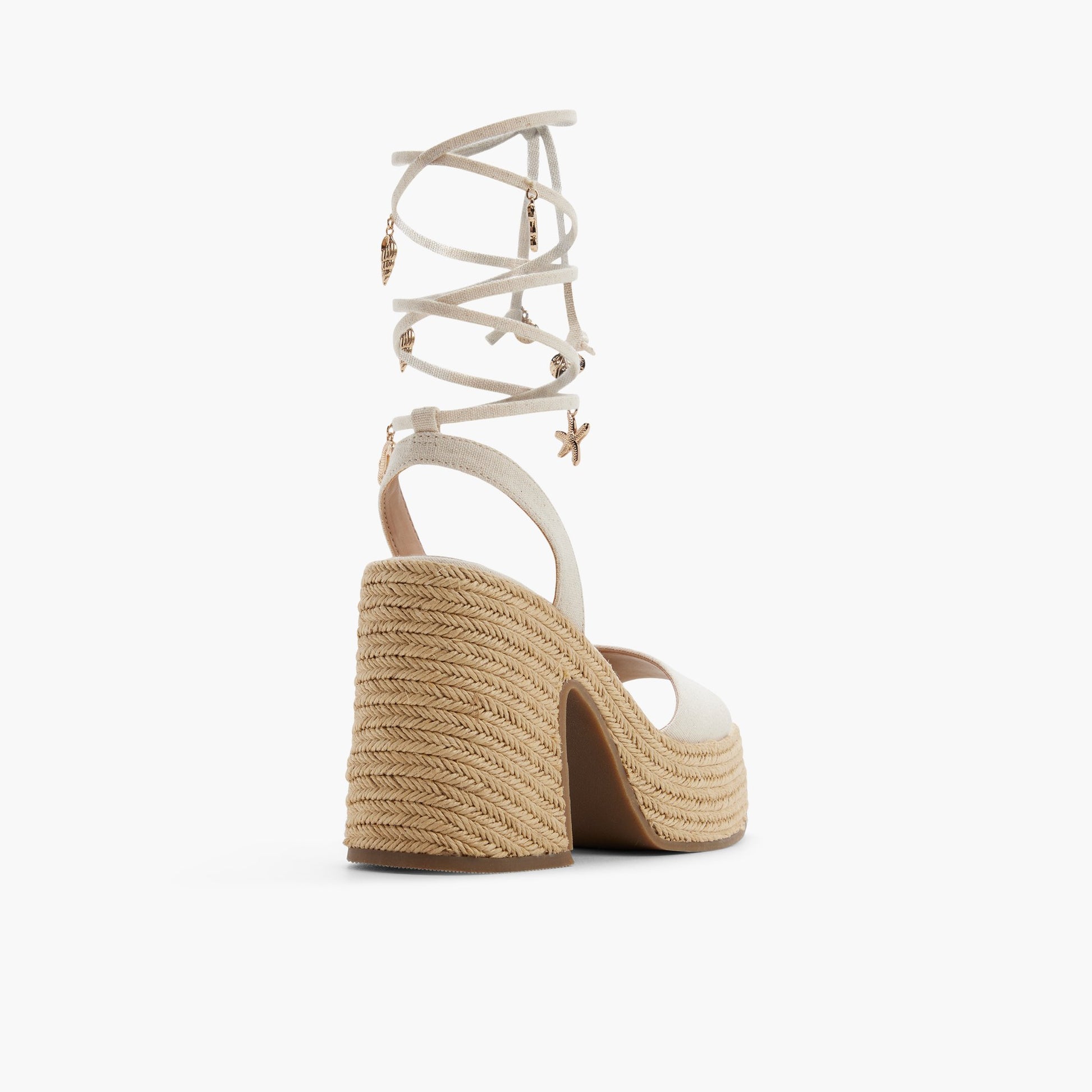 Three-quarter angle of Natural Caprii Platform Lace-Up Sandals's back side