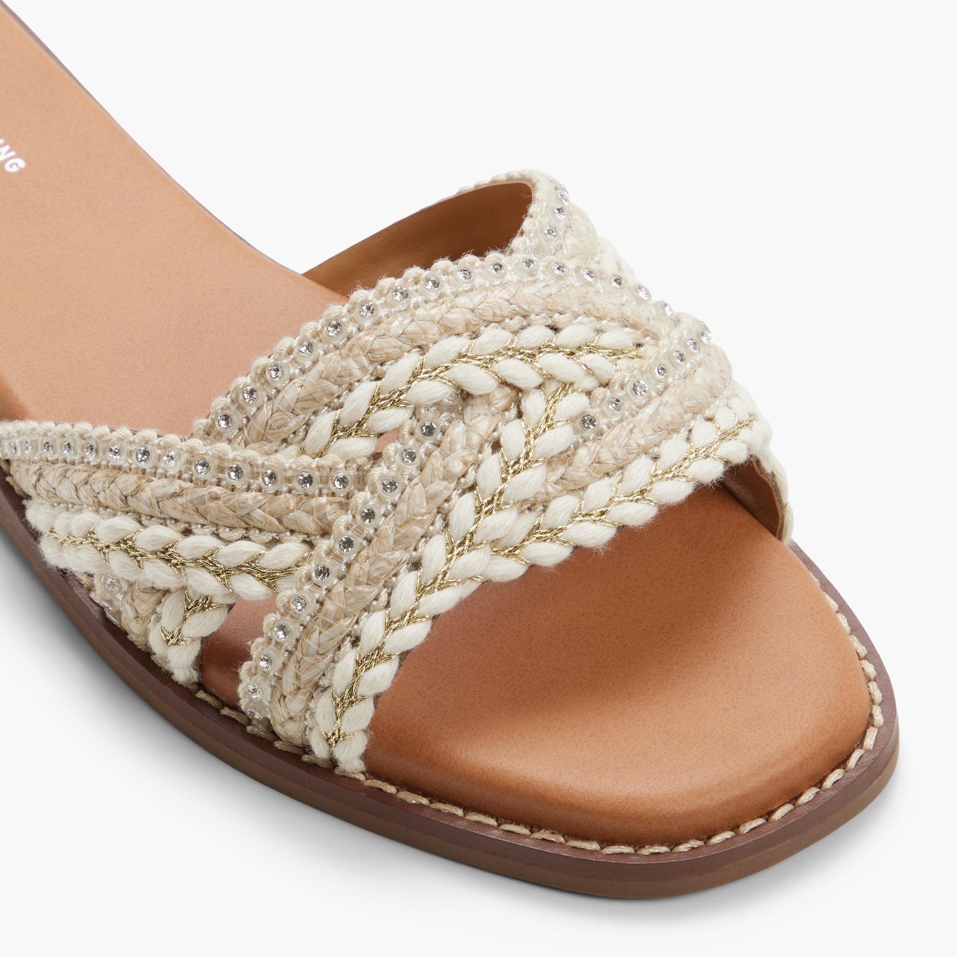 Close-up of the Other beige Zalani Slides