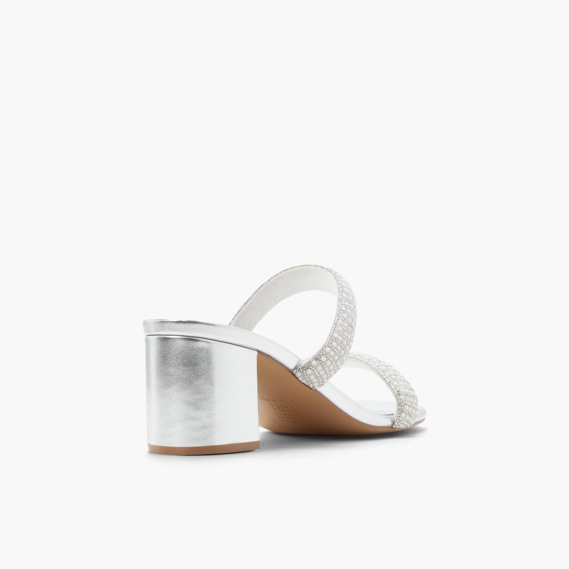 Three-quarter angle of Silver Calianaa Block Heel Mules's back side