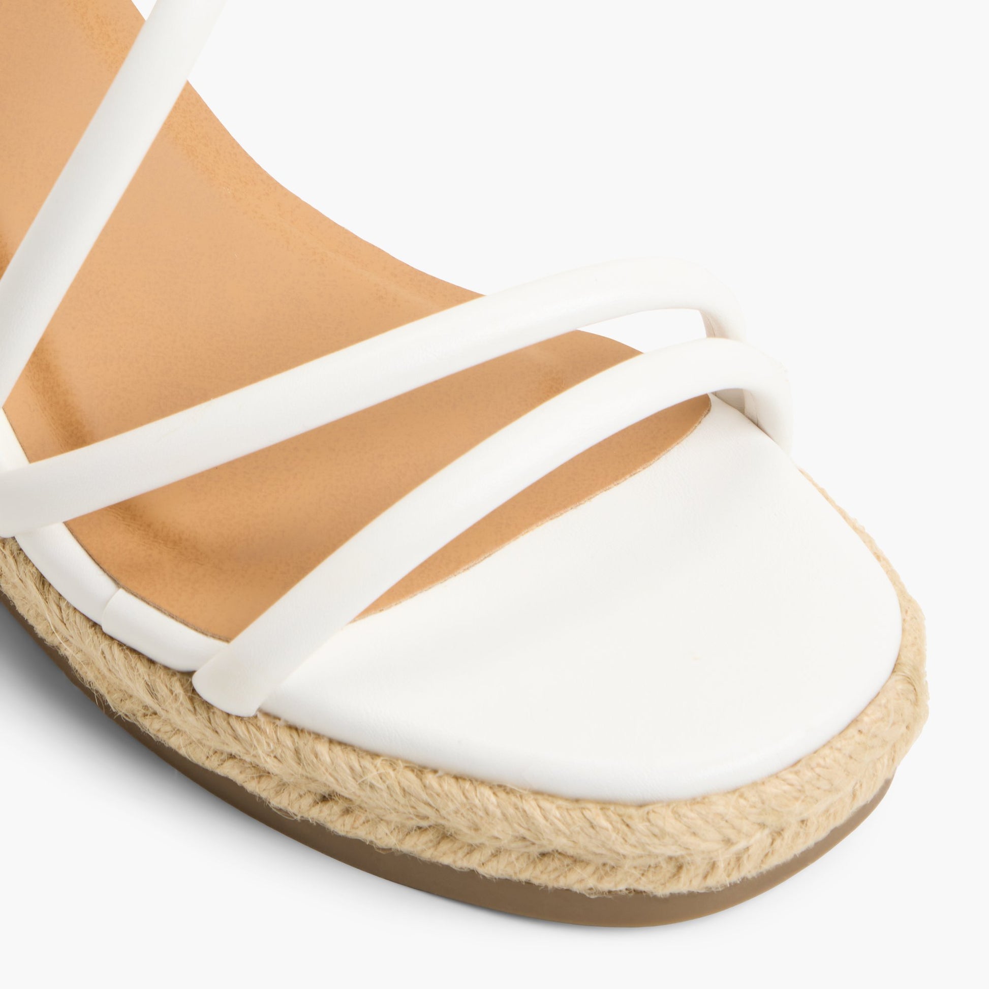 Close-up of the White Alanah Wedge Sandals