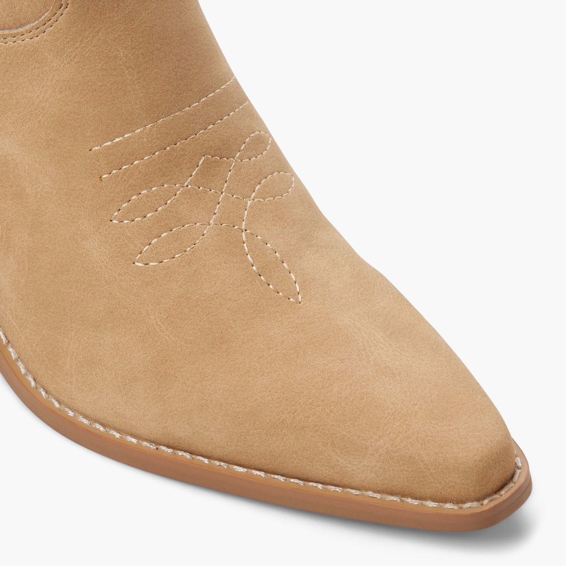 Gros plan de la Beige Dixilou Bottes western hautes