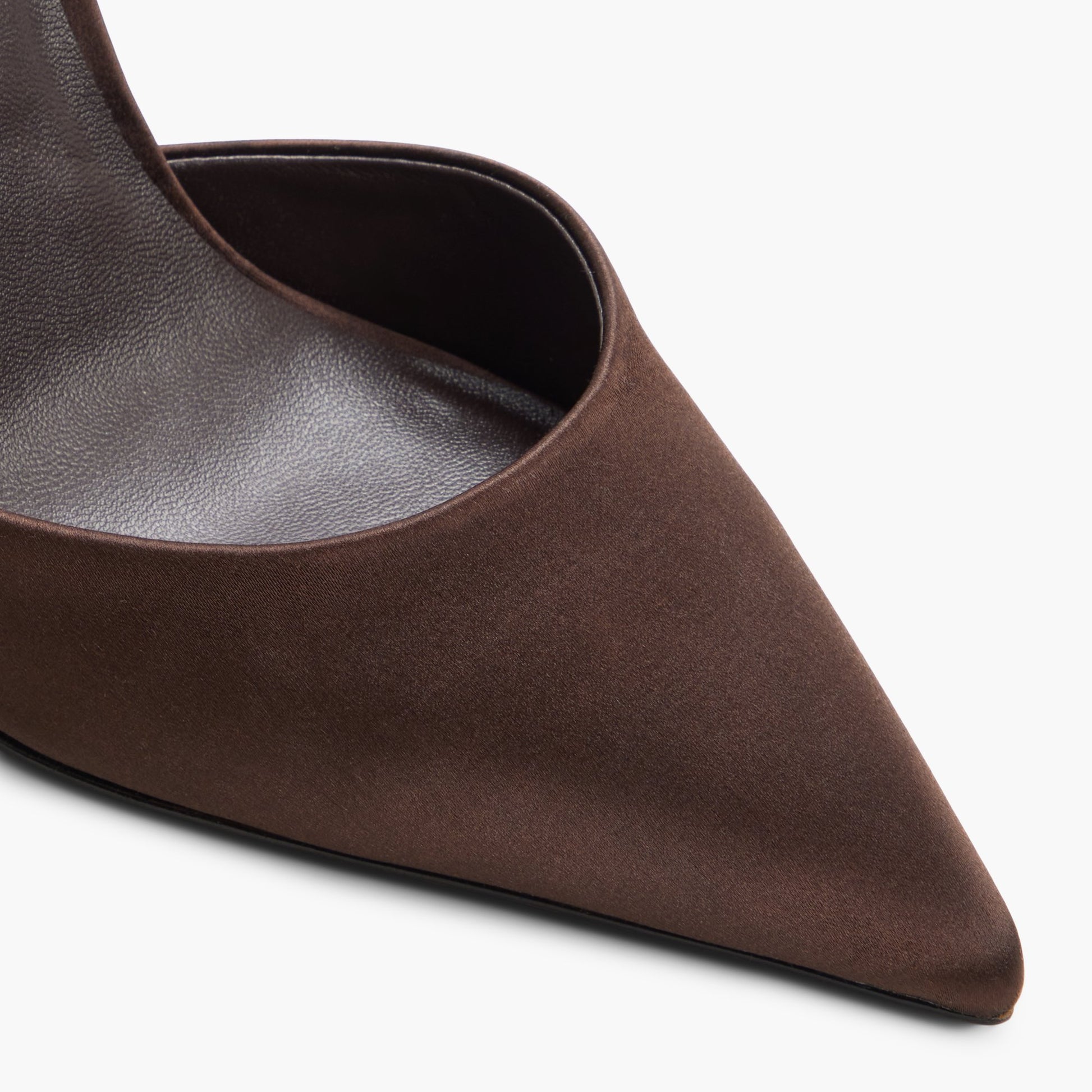 Close-up of the Other brown Demuree Slingback Pumps