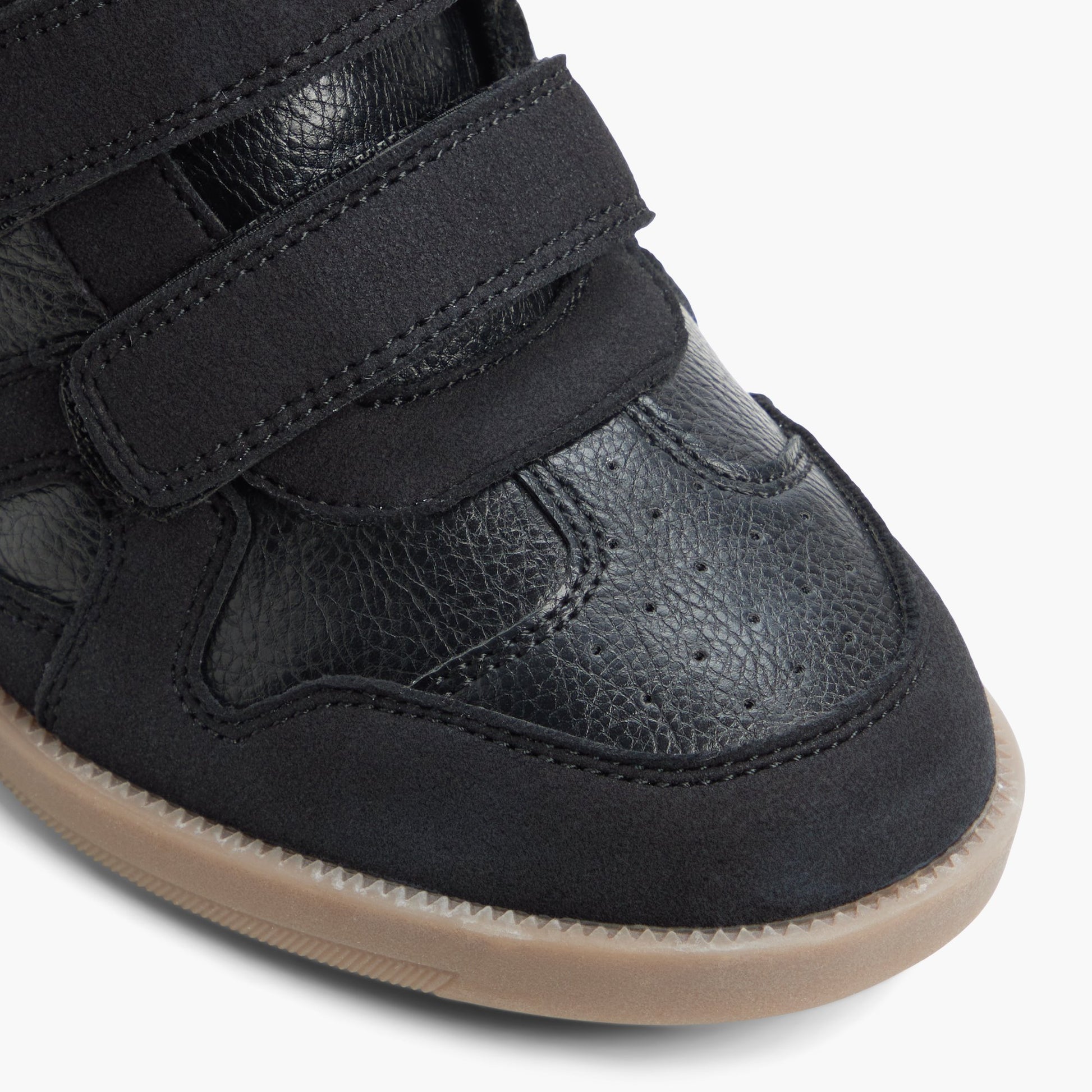 Close-up of the Black Ovela Wedge Sneakers
