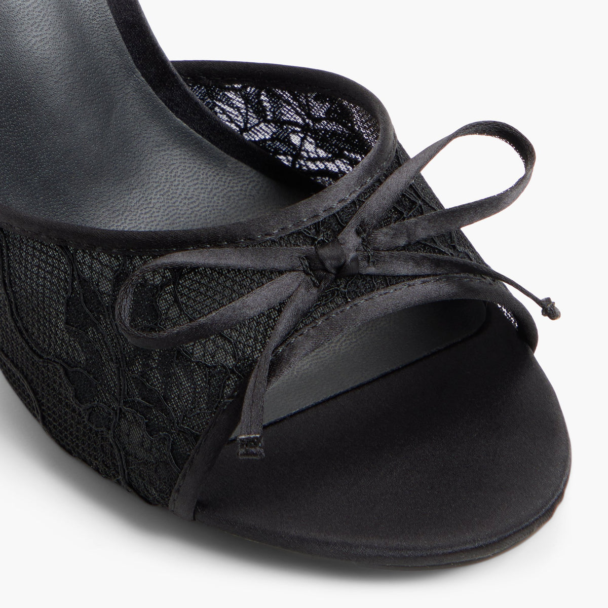 Close-up of the Black Juniee Heeled Mule Sandals