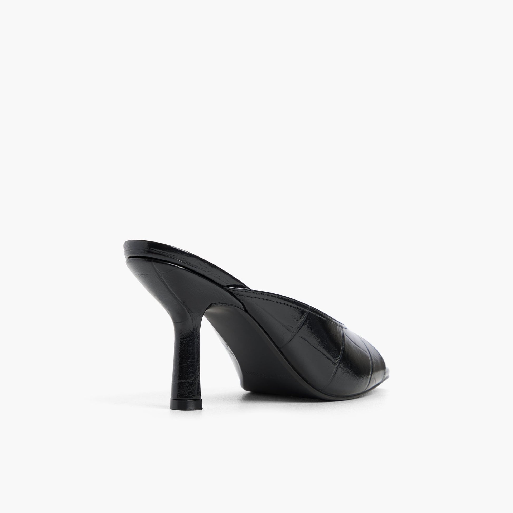 Three-quarter angle of Black Sunaa Heeled Mule Sandals's back side