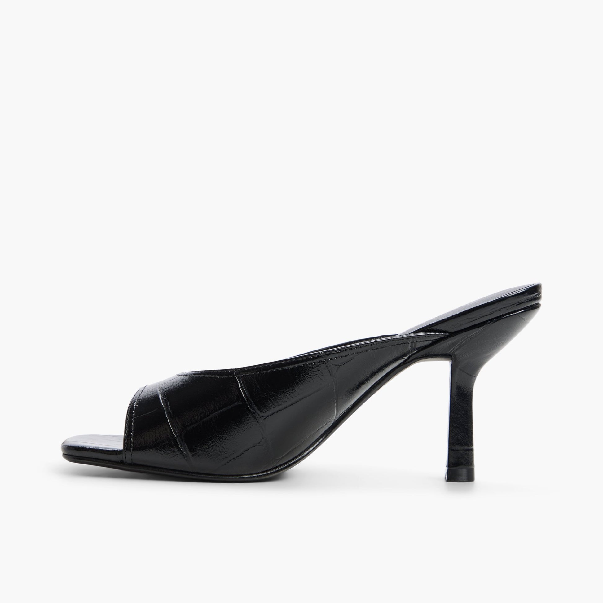 Side view of Black Sunaa Heeled Mule Sandals
