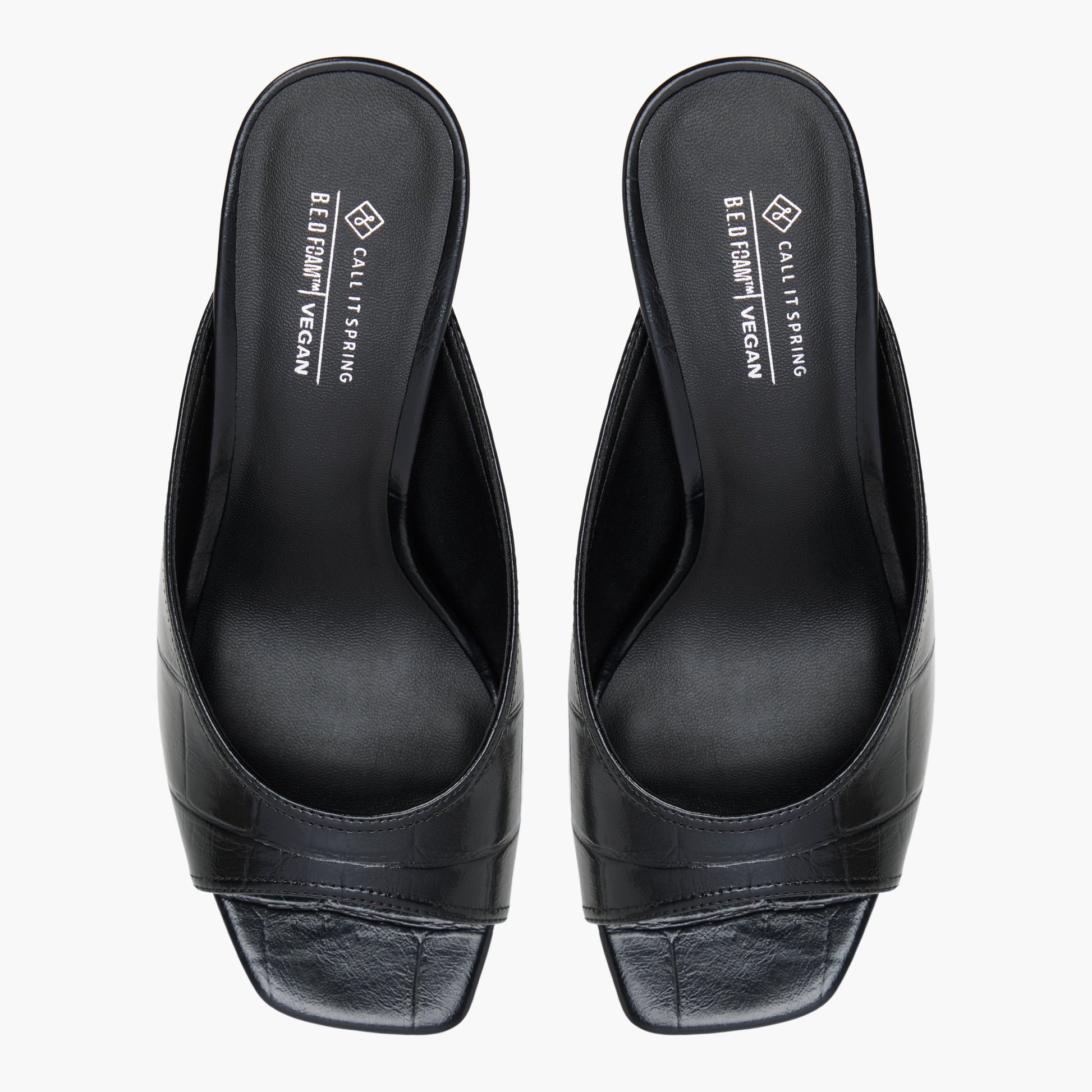 Top-down view of the Black Sunaa Heeled Mule Sandals
