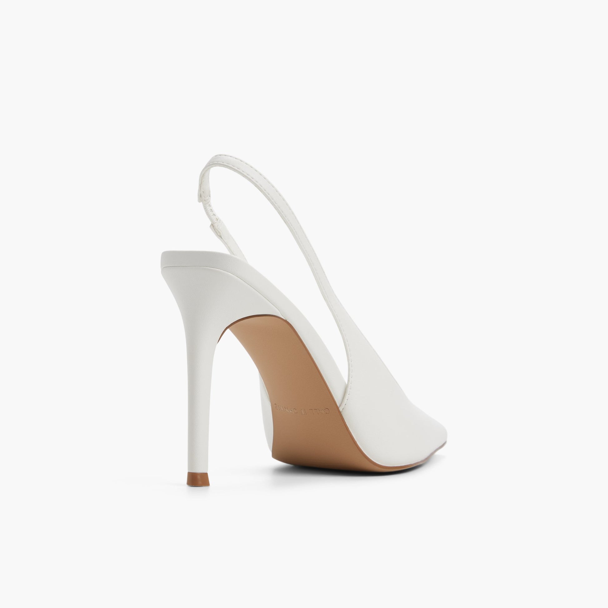 Three-quarter angle of White Daniellaa Slingback Heels's back side