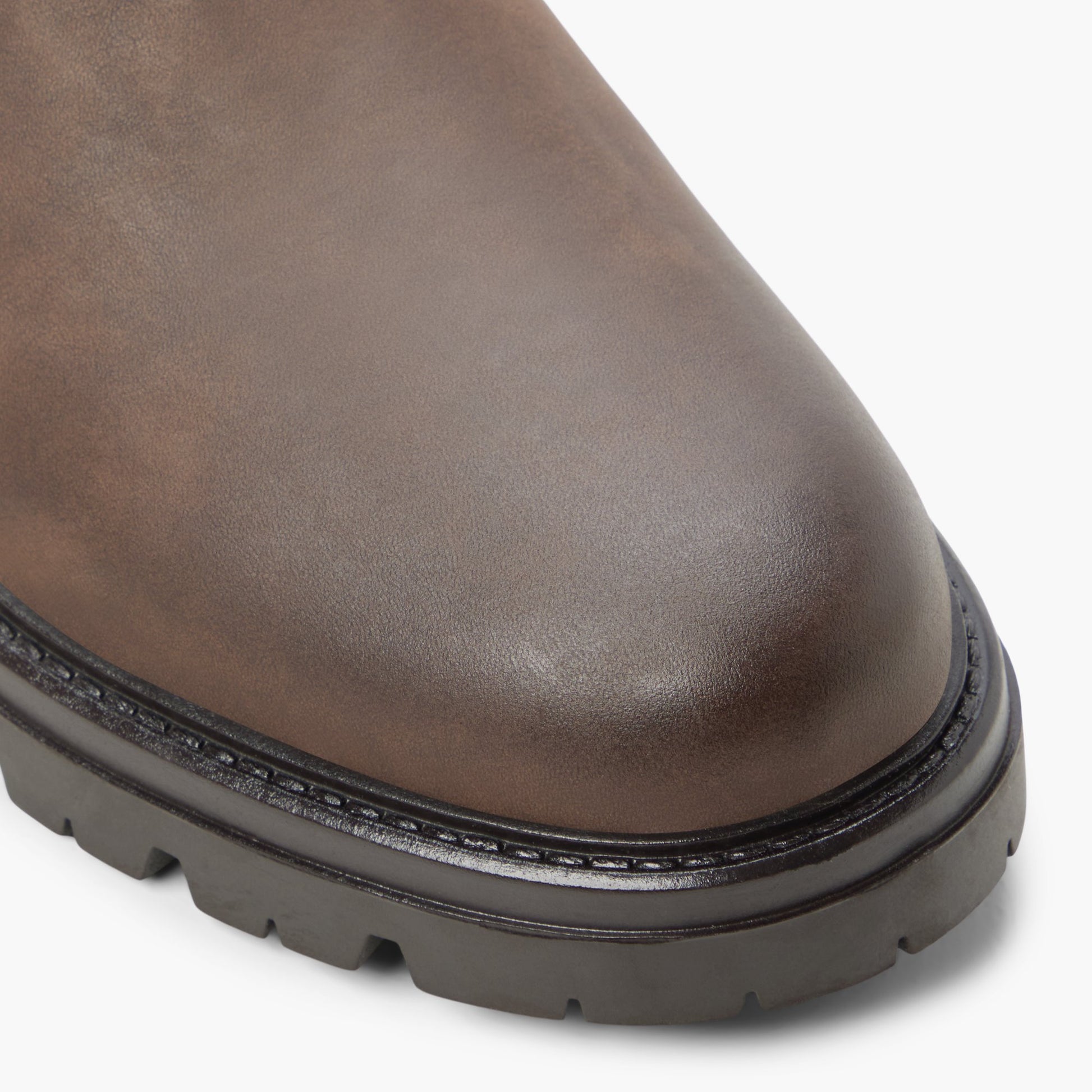 Gros plan de la Brun Defender Bottes Chelsea